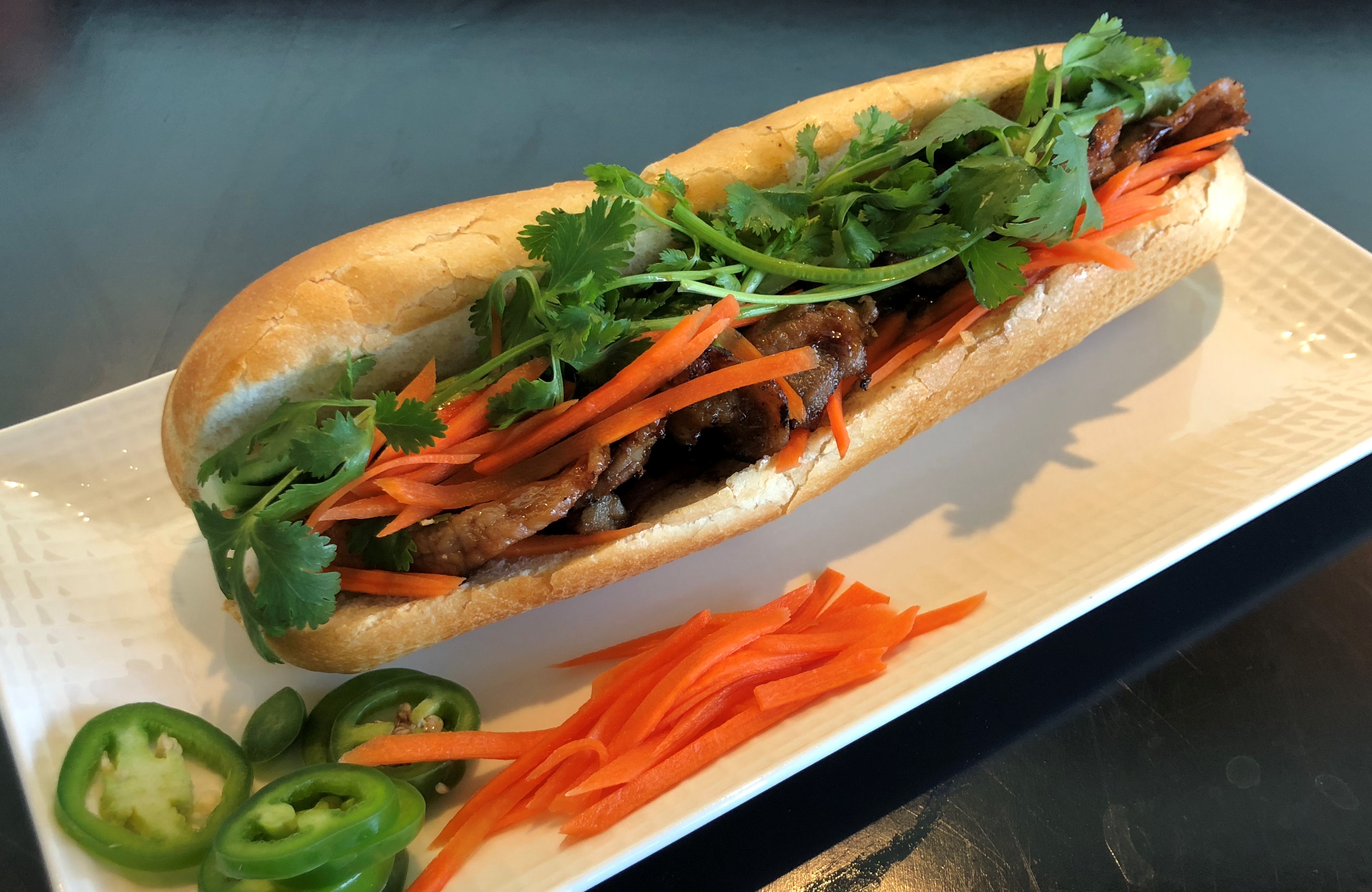 Order B2. Baguette CharBroiled Pork food online from Pho Amour store, Fontana on bringmethat.com