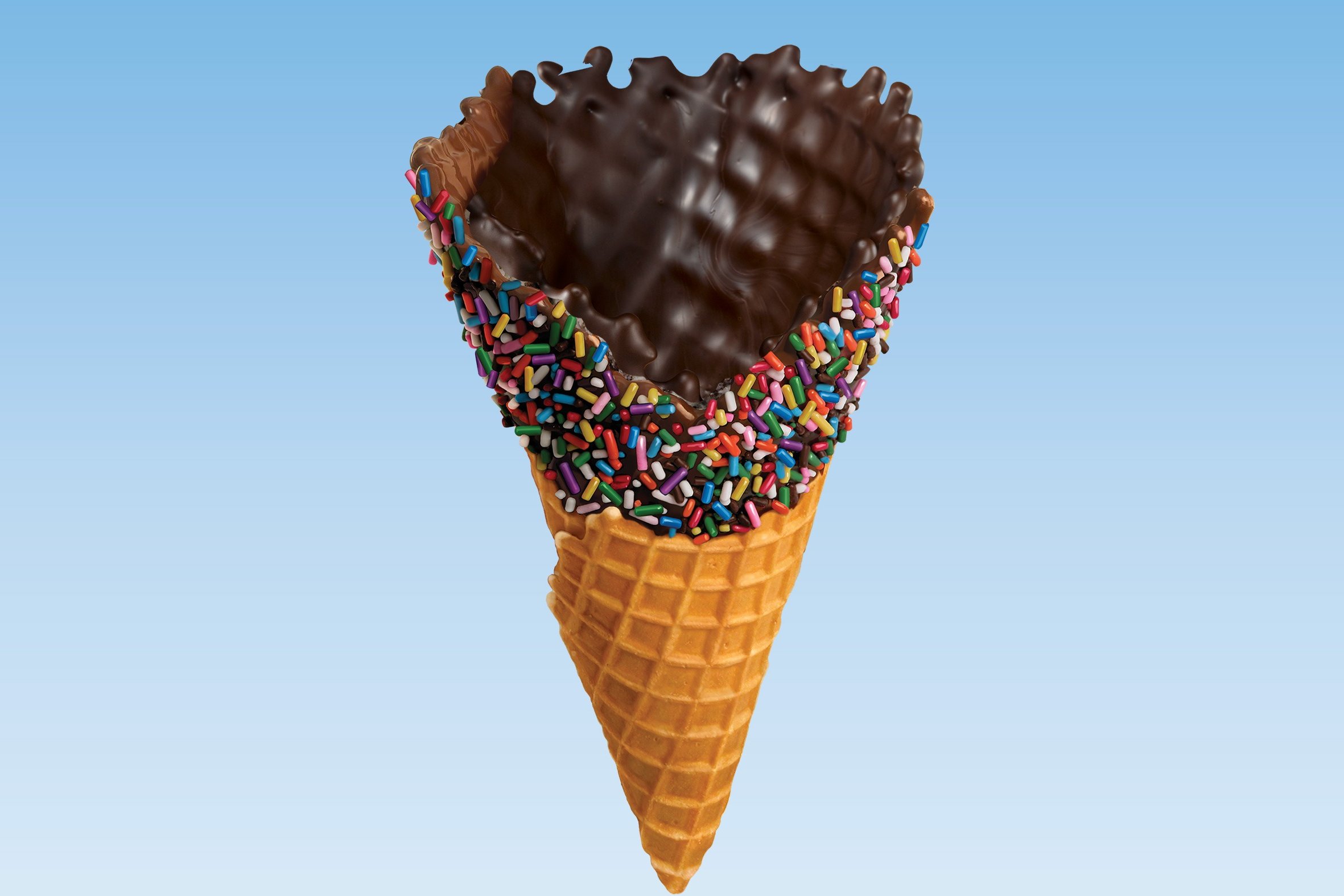 Order Chocolate with Rainbow Sprinkles Dipped Waffle Cone food online from Ben & Jerry's store, Plano on bringmethat.com