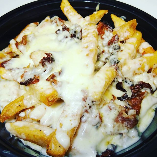 Order Large Mega Fries food online from Lula's Deli Corner store, Clifton Heights on bringmethat.com