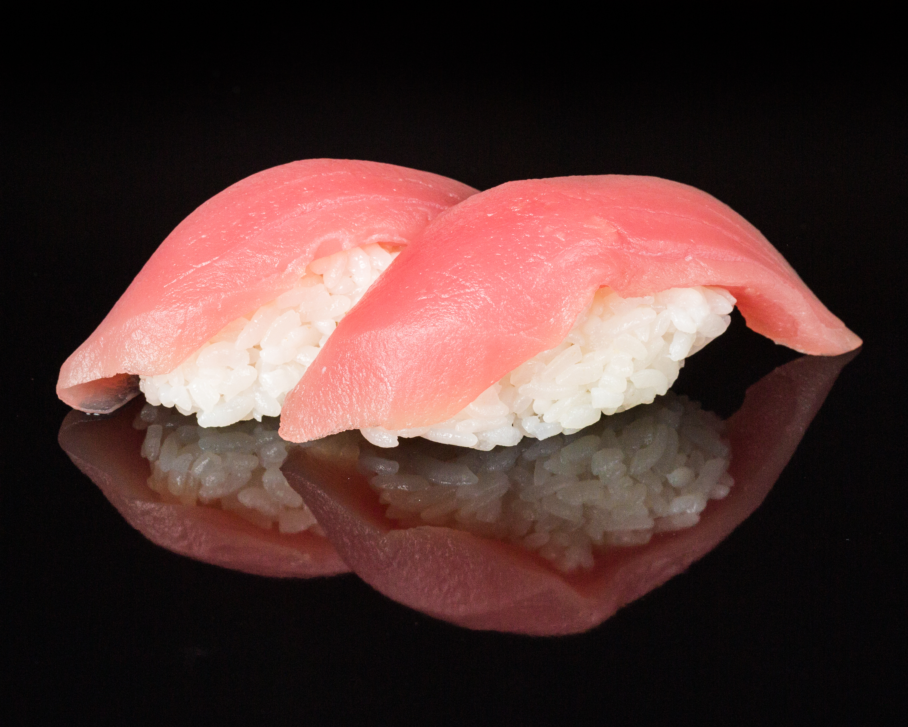 Order 2 Pieces Tuna food online from Sushi Sakura Express store, Houston on bringmethat.com