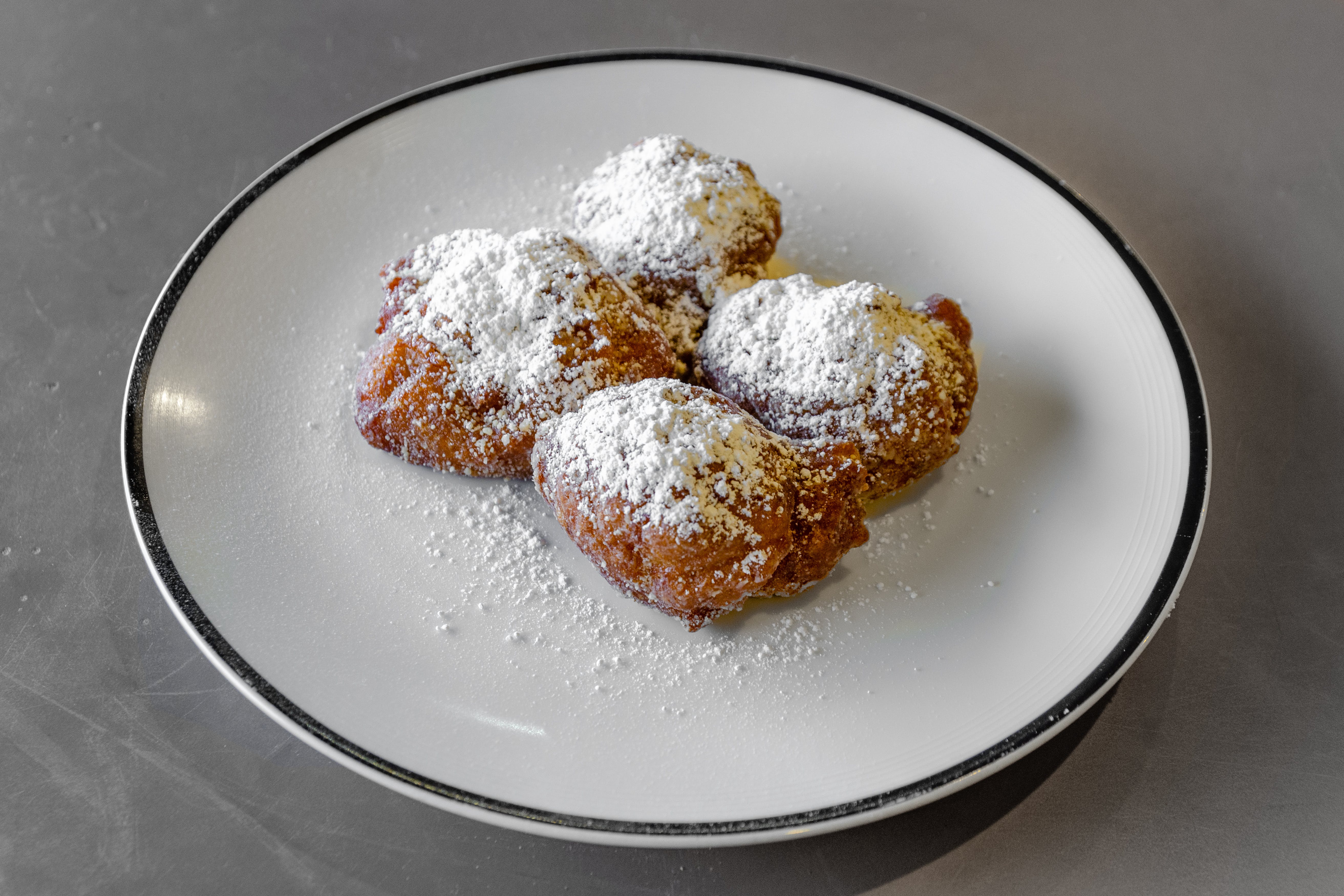 Order Zeppole - 4 Pieces food online from Piazza pizza store, Astoria on bringmethat.com
