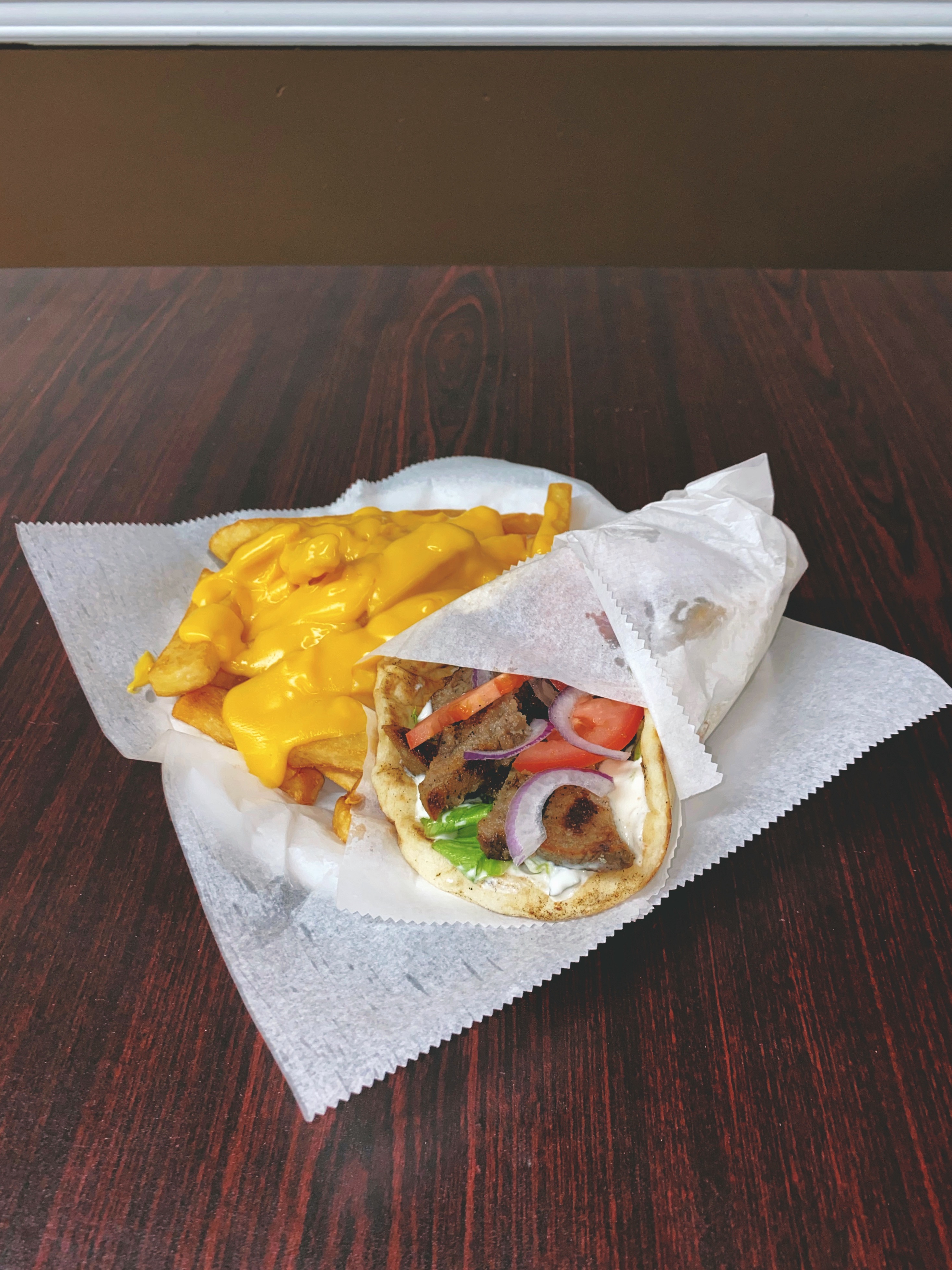 Order Gyro Meal food online from Chuck's Cafe store, Hamilton Township on bringmethat.com