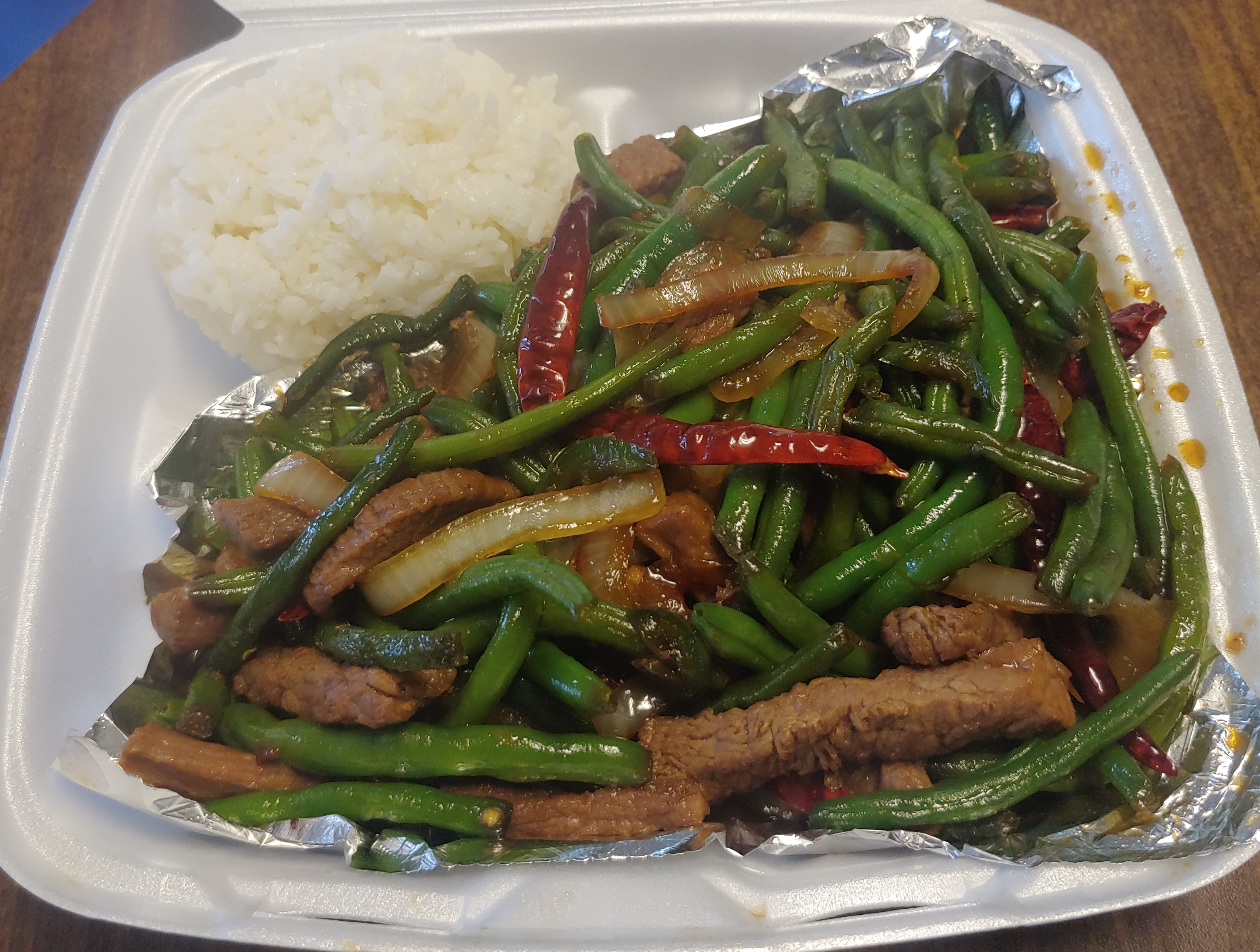 Order Spicy Green Beans with Beef food online from Laredo Sushi Roll store, Laredo on bringmethat.com