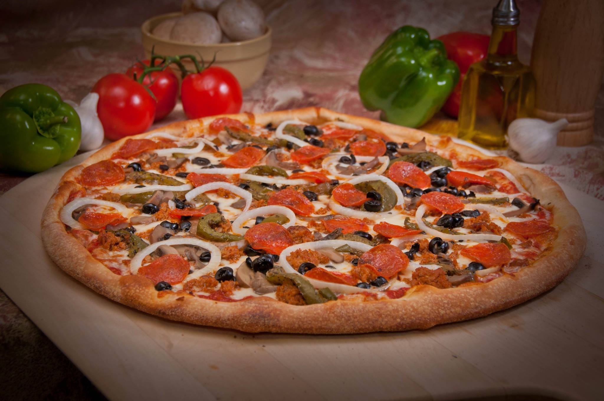 Order Deluxe Pizza food online from Original Italian Pizza store, Watertown on bringmethat.com