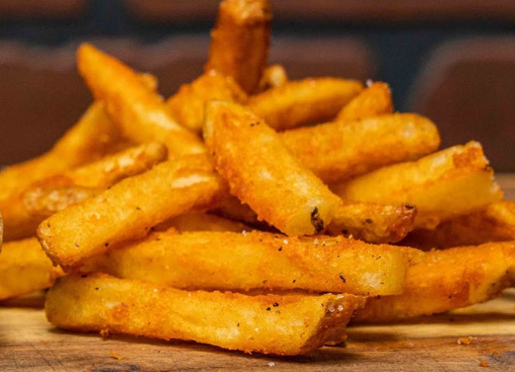 Order Cajun Fries food online from Big Belly Que store, Smithtown on bringmethat.com