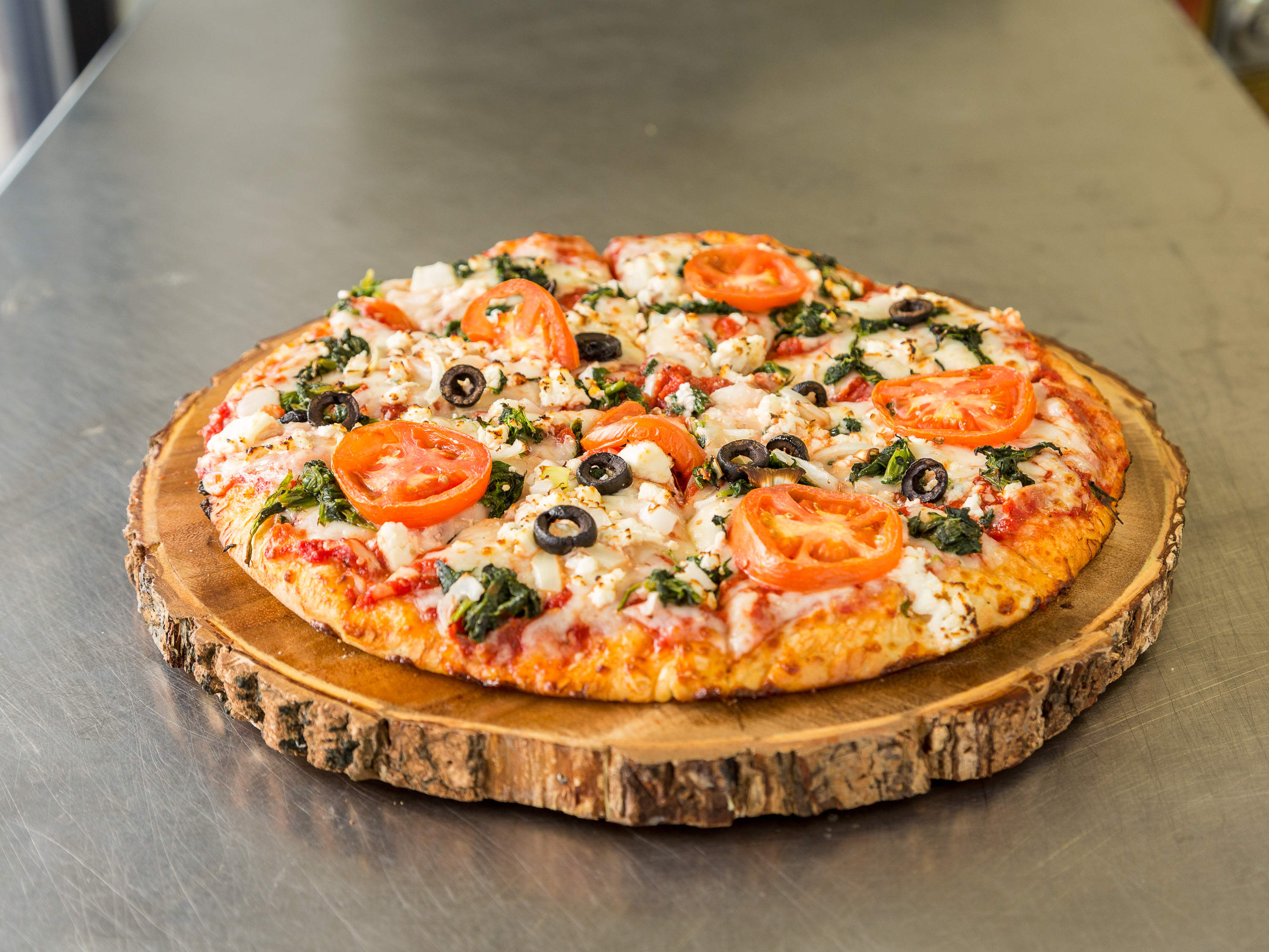 Order Feta Greek Lovers Veggie Pizza food online from Revolution Pizza store, Willowick on bringmethat.com