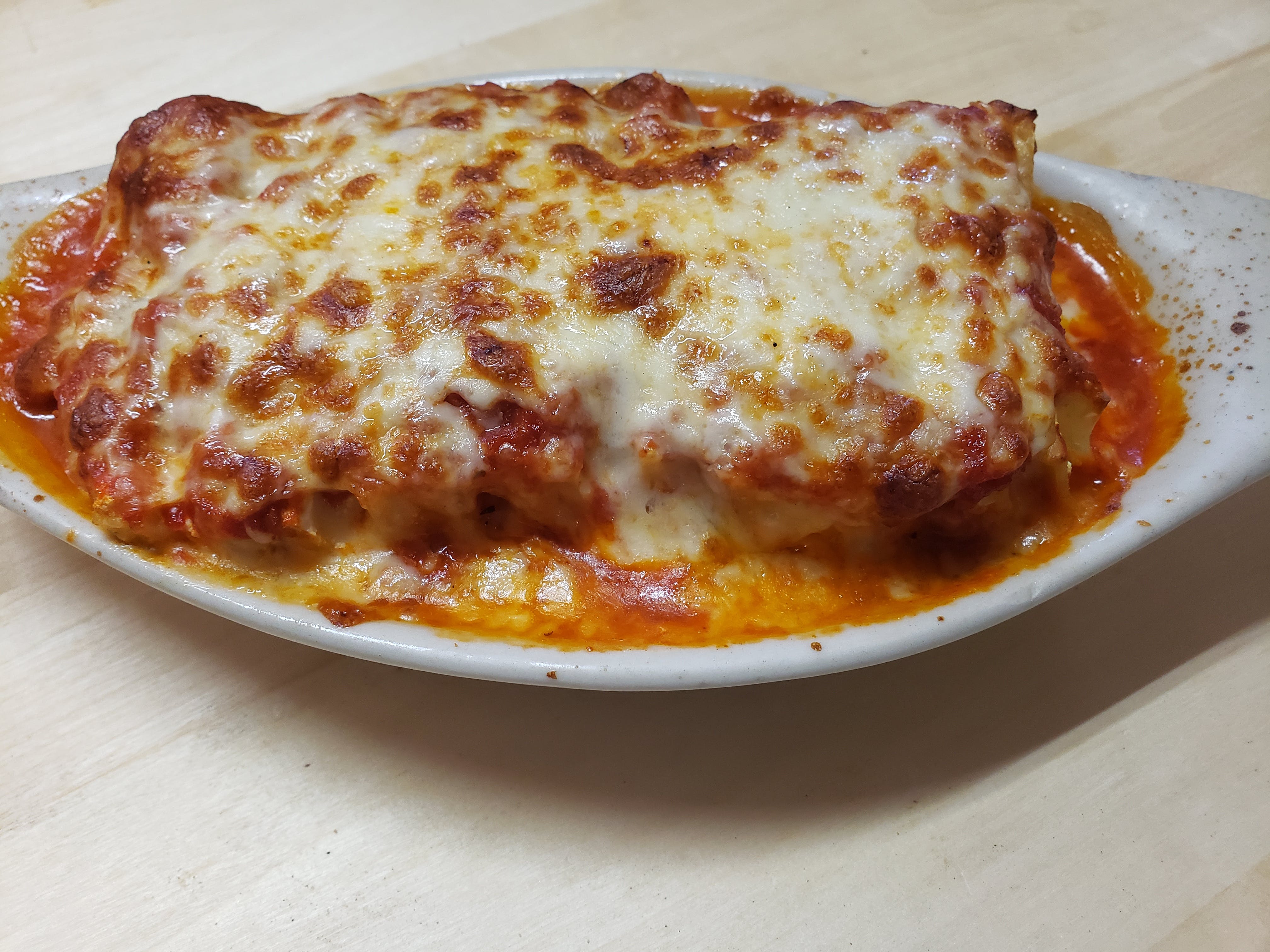 Order Lasagna - Small food online from Belleview Pizza & Italian Restaurant store, Belleview on bringmethat.com