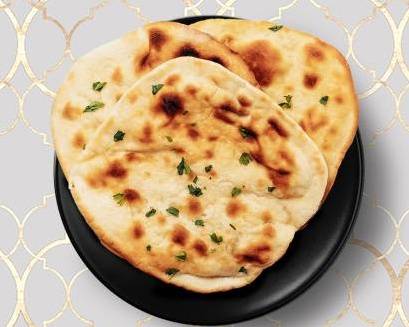 Order Plain Naan food online from Curry Villa store, Southern Pines on bringmethat.com