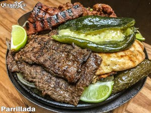Order Carne Asada Plate "Parrillada" for Two food online from El Querreque Grill store, Laredo on bringmethat.com