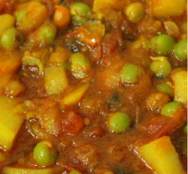 Order  Aloo Mutter Diced potato and green peas  food online from Cuisine of India store, Naperville on bringmethat.com