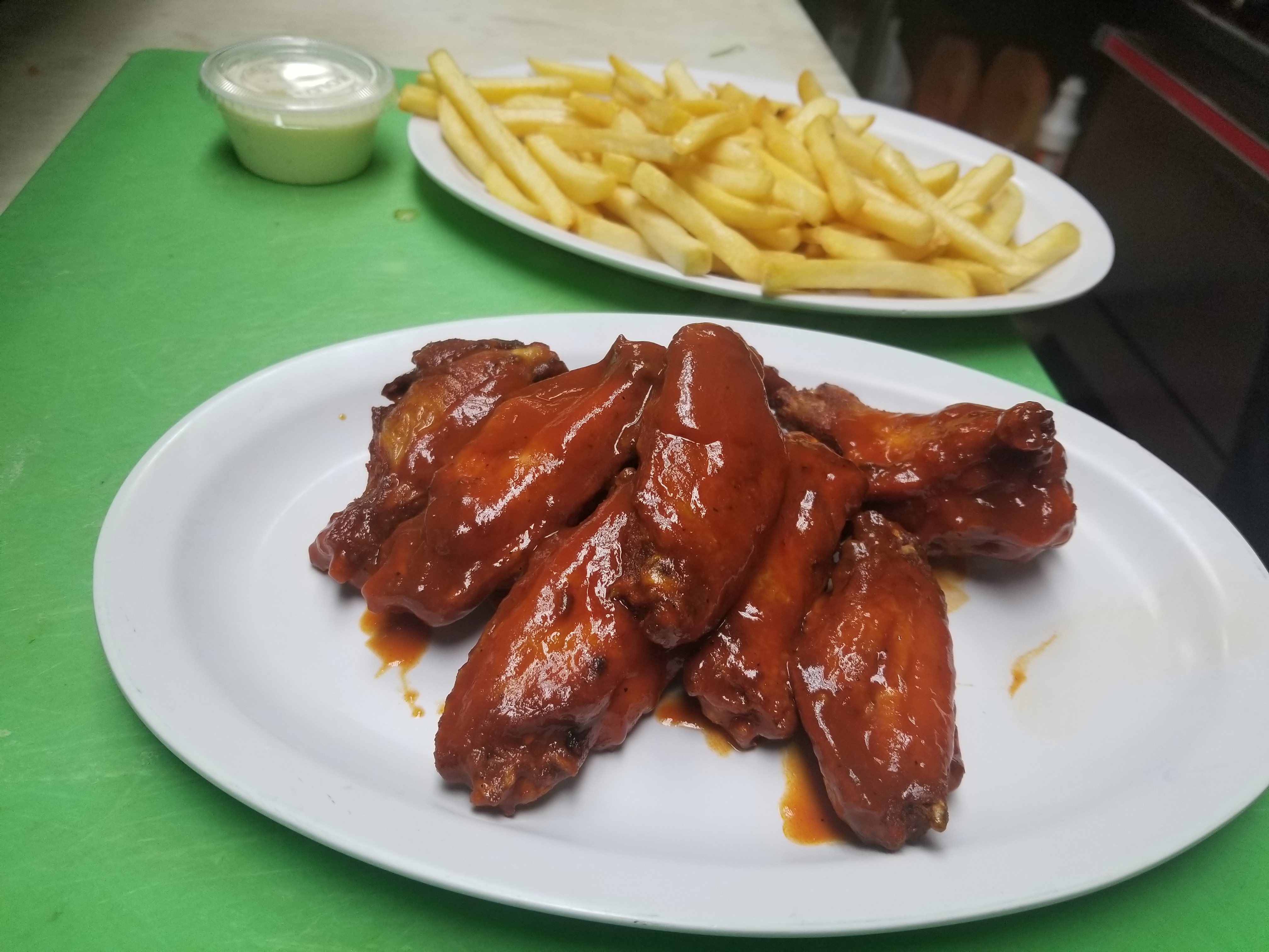 Order Buffalo Wings food online from Pizzarelli's Pizza store, Scarsdale on bringmethat.com