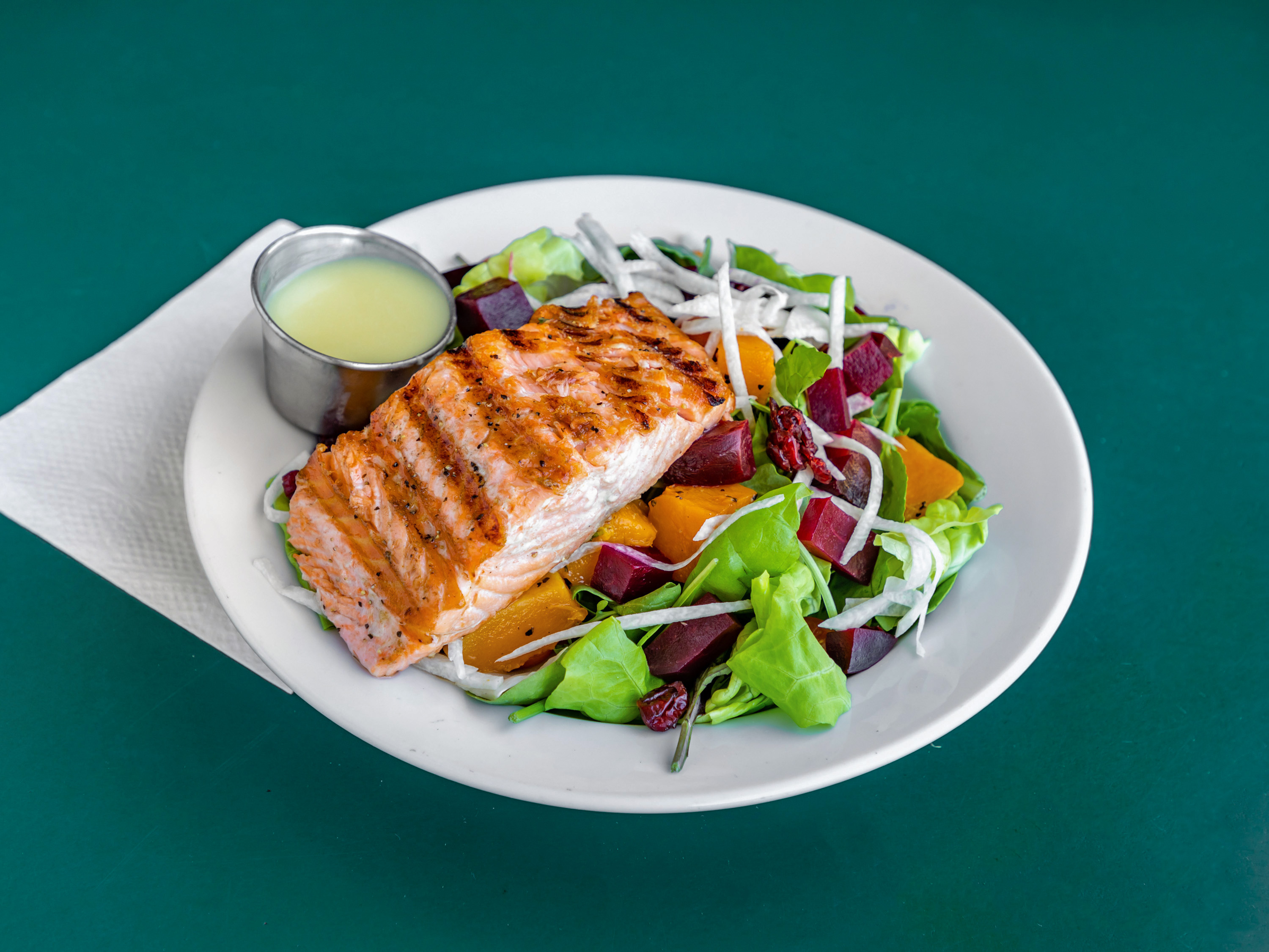 Order Salmon Salad food online from Ciccero's Pizza store, Los Angeles on bringmethat.com