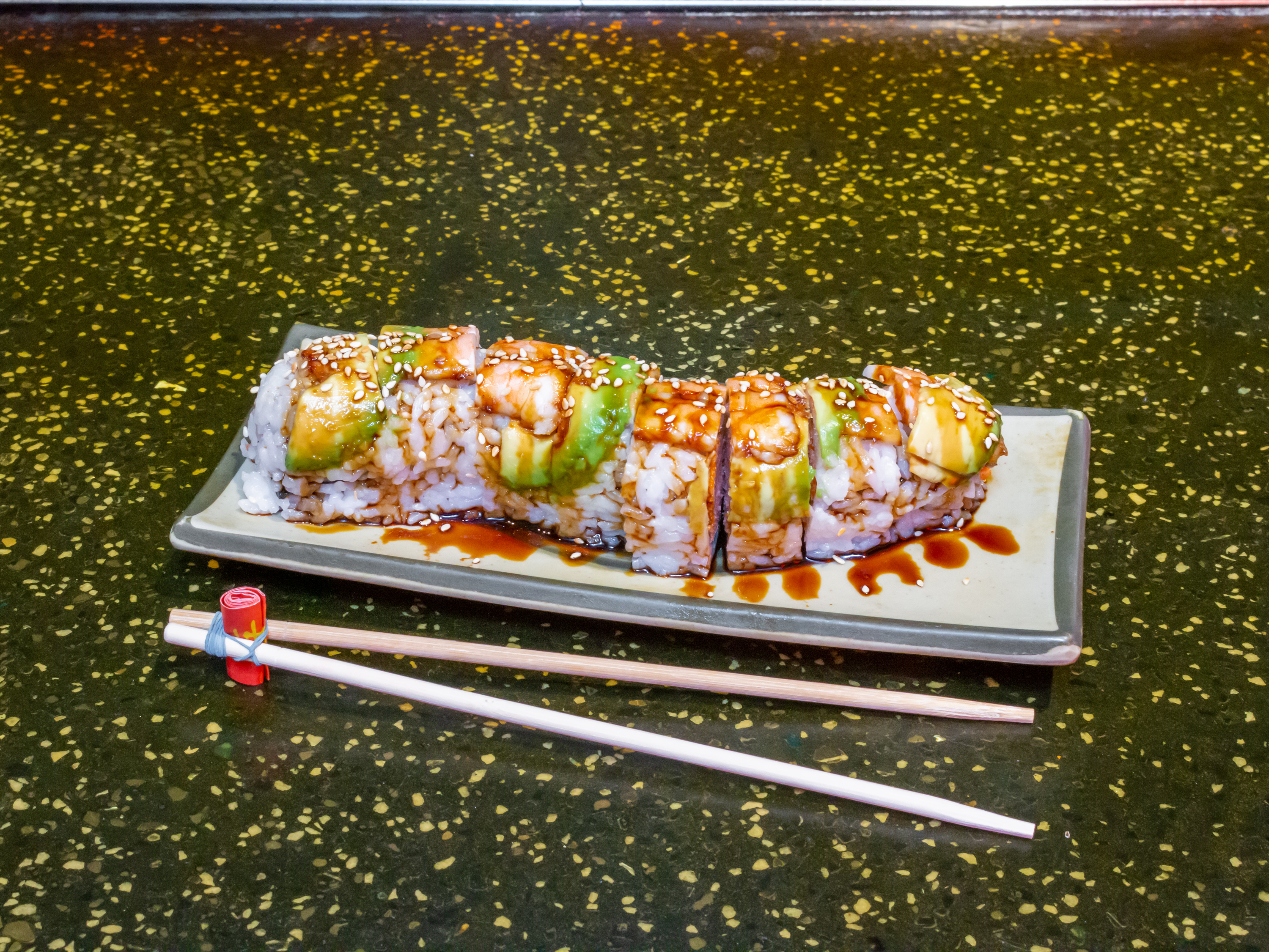 Order 8 Piece Caterpillar Roll  food online from Yue-Sun Japanese Steak House store, Wood Dale on bringmethat.com