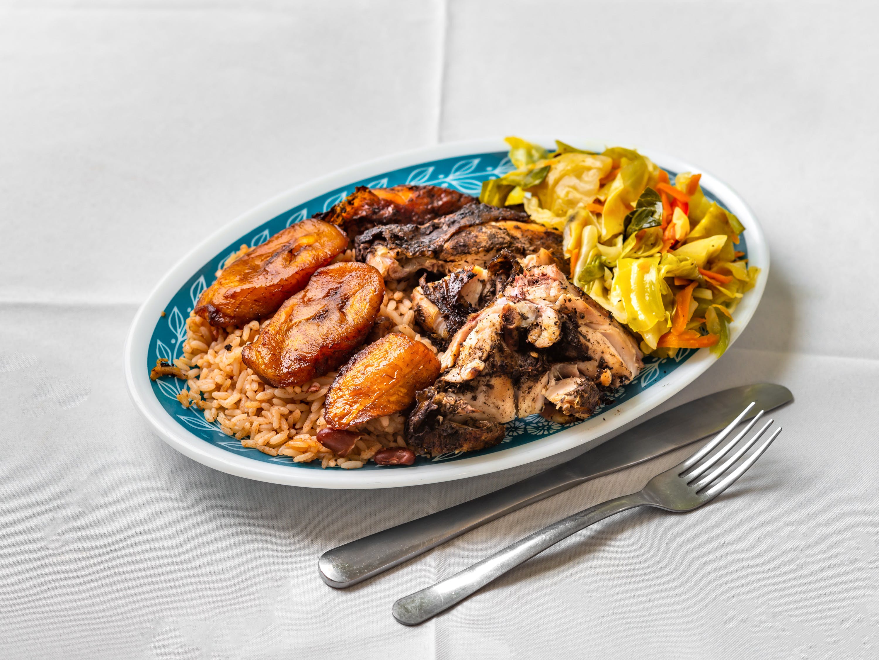 Order Jerk Chicken Meals - Half food online from Rhythm And Spice Pizzeria And Grill store, New Brunswick on bringmethat.com