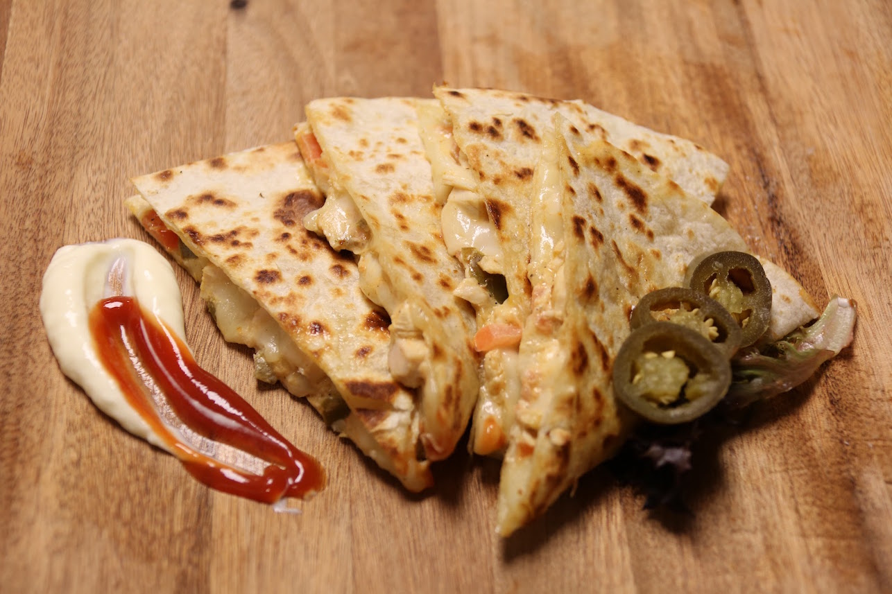 Order Buffalo Chicken Quesadilla food online from The Burger Joint store, New York on bringmethat.com