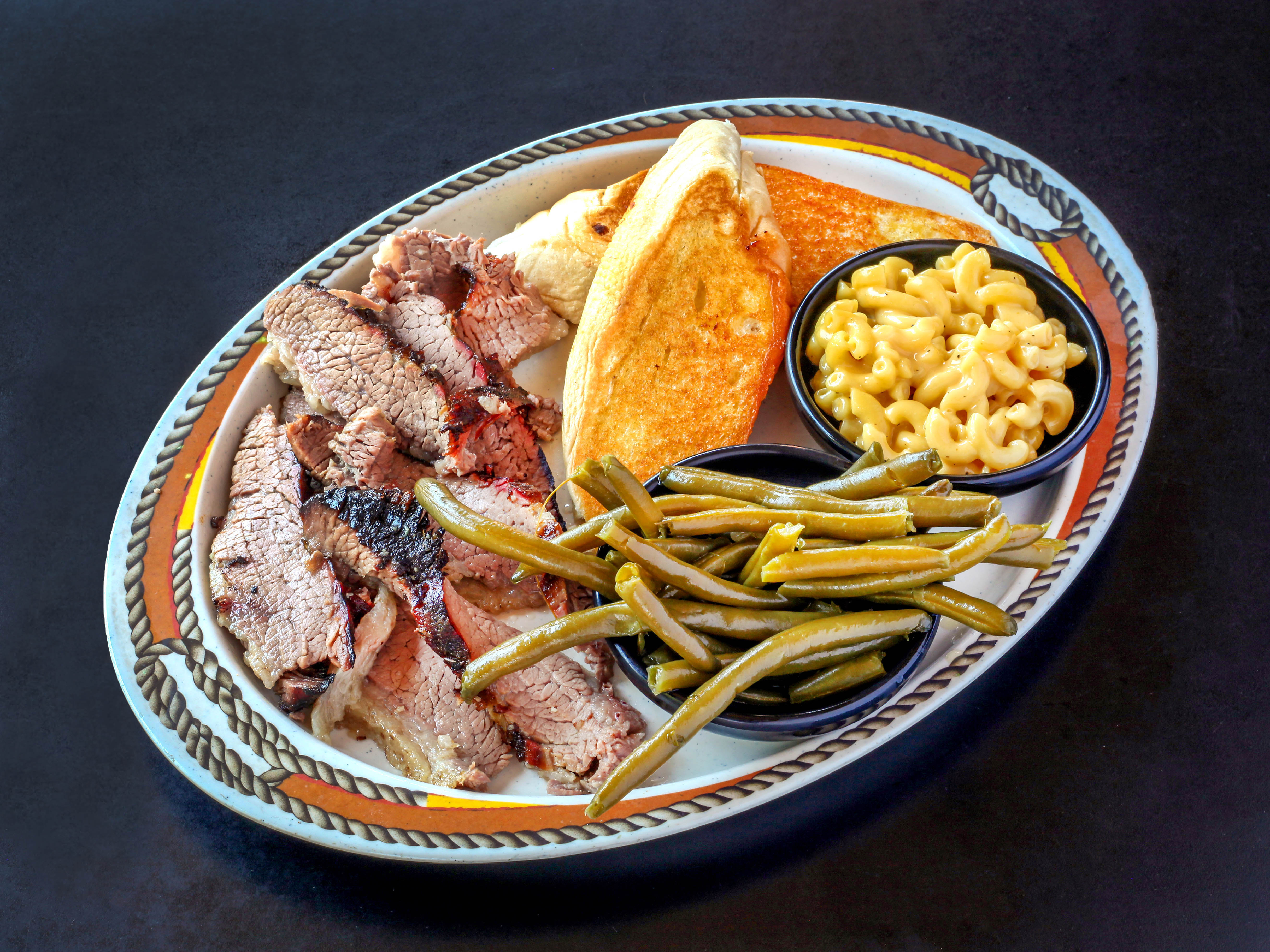 Order 6 oz. Beef Brisket Lunch Plate food online from Smoking Barrels BBQ store, St Louis on bringmethat.com