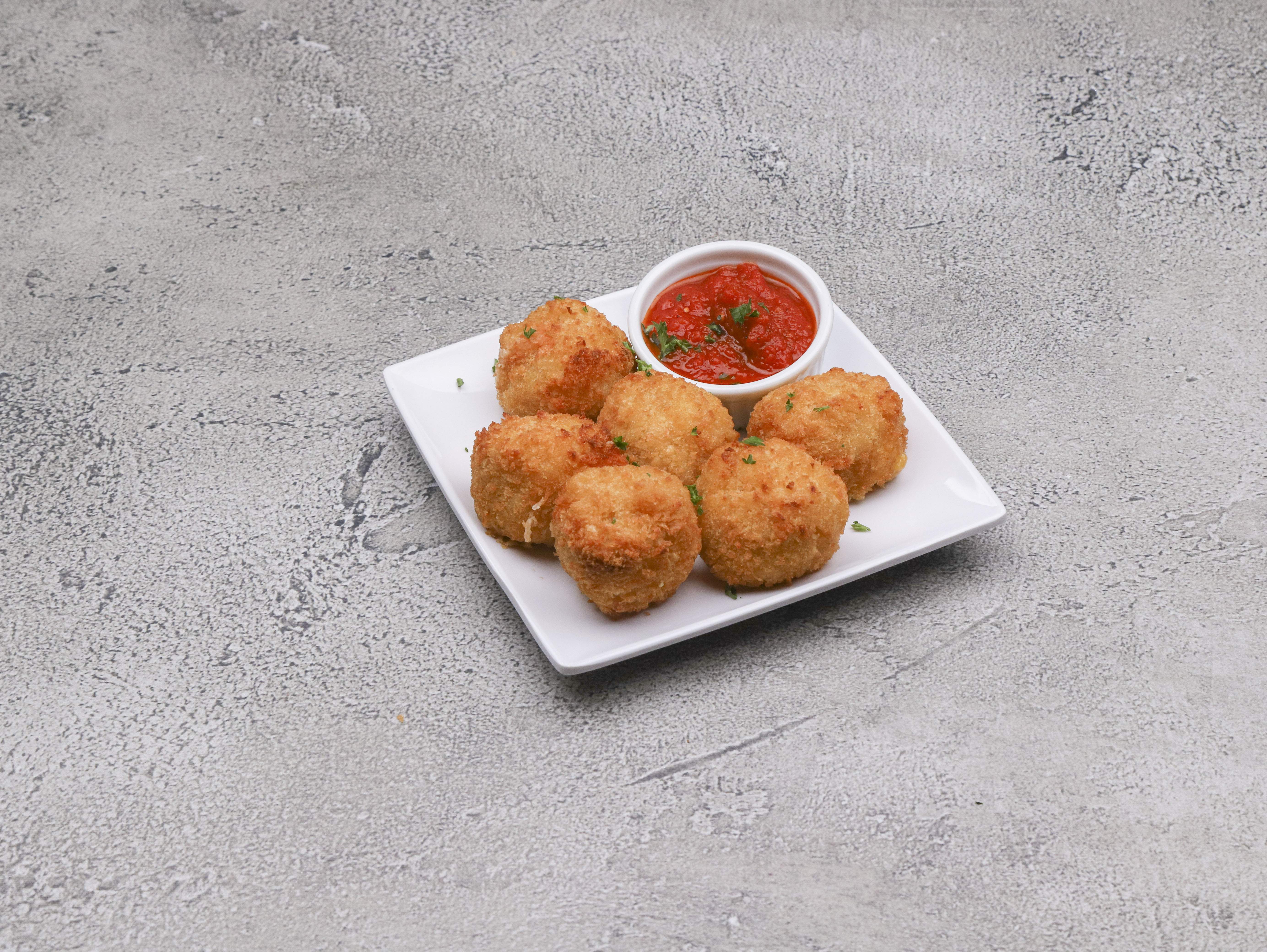Order 6 Piece Fried Macaroni and Cheese Balls food online from Bobby Chez Crab Cakes store, Cherry Hill on bringmethat.com
