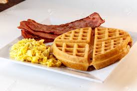 Order Belgian Waffle with 2 Eggs Any Style and Choice of Meat food online from Kellogg's diner store, Brooklyn on bringmethat.com