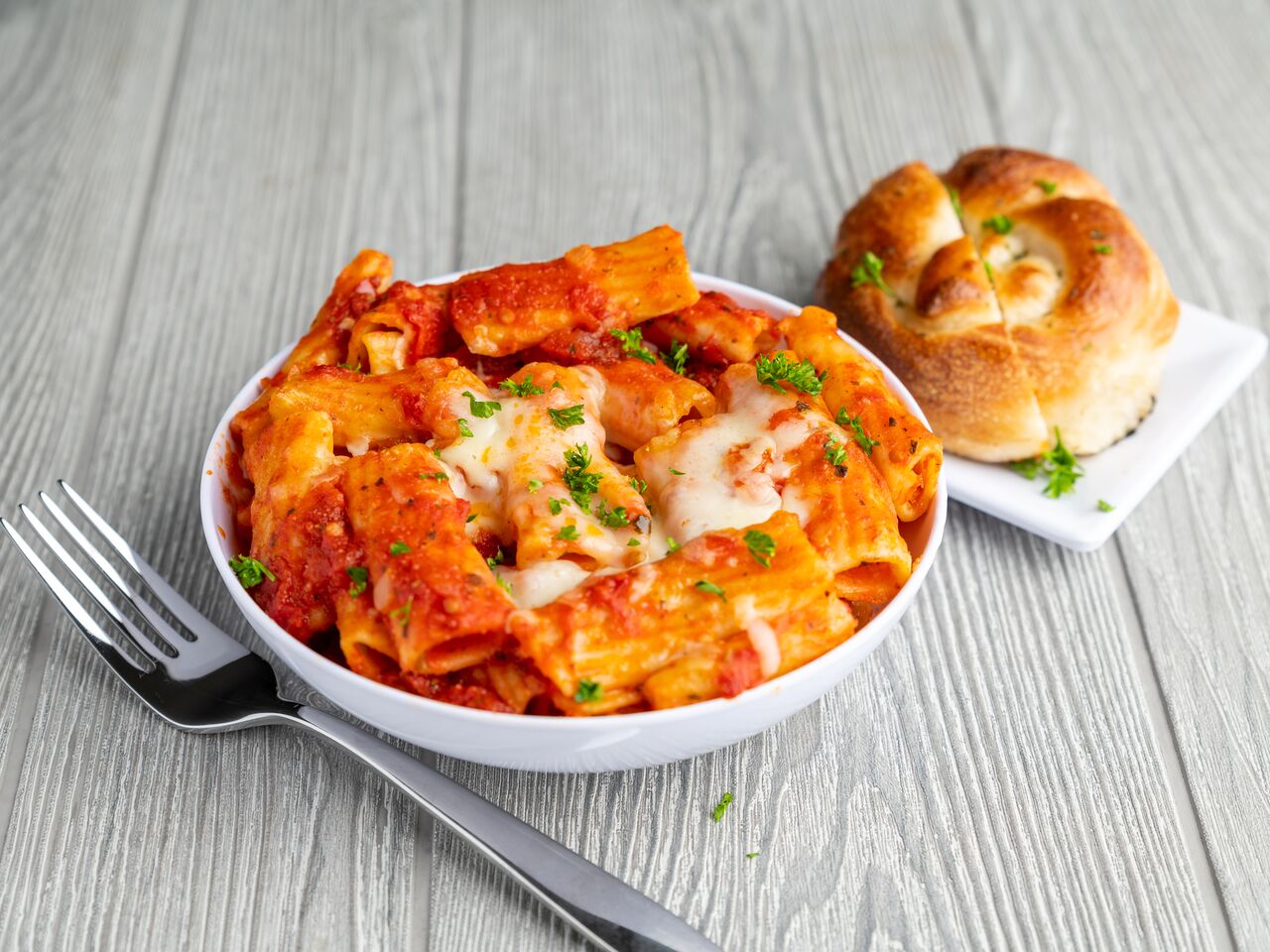 Order Baked Ziti food online from Niki Pizza store, Round Rock on bringmethat.com