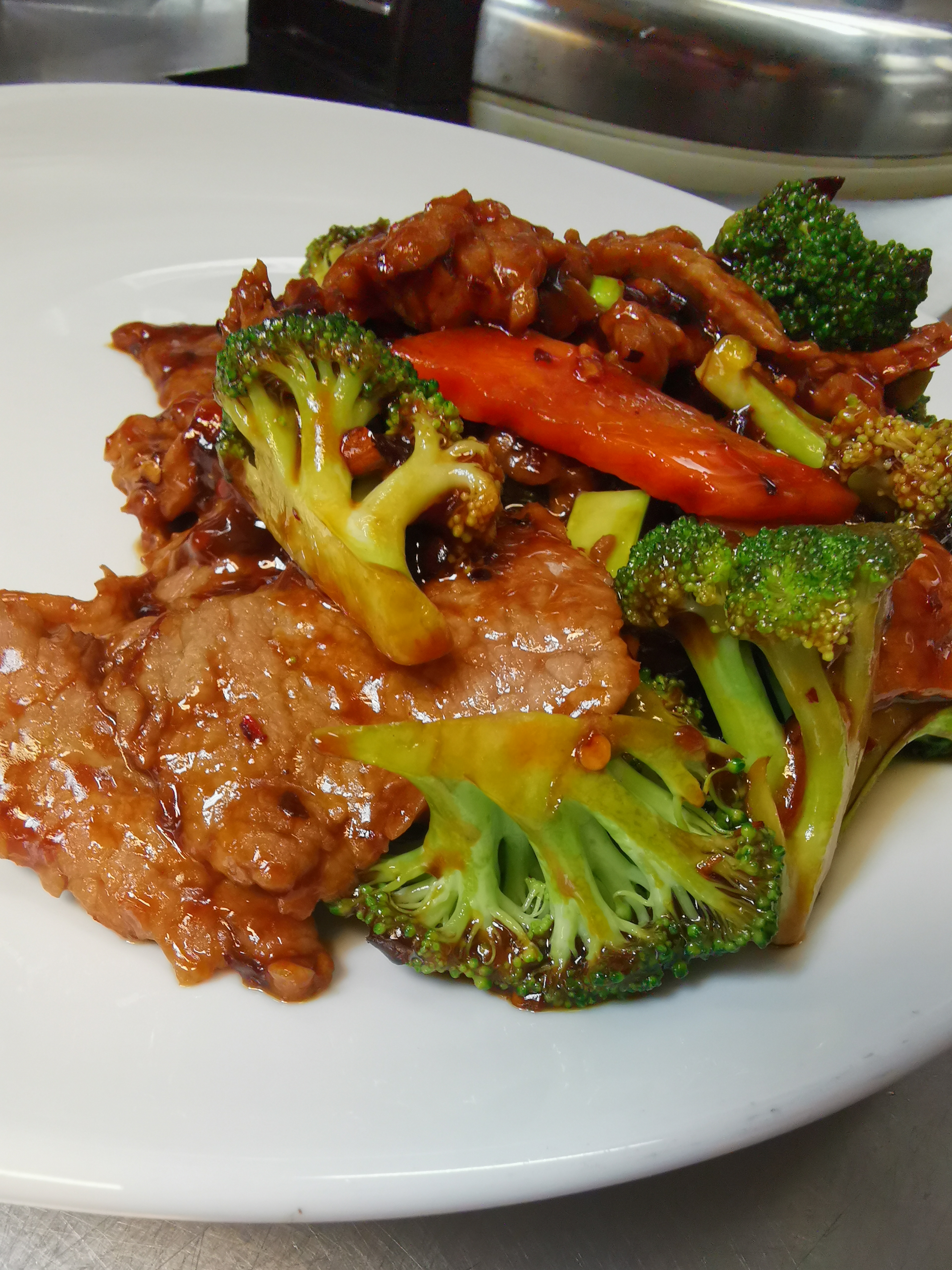 Order Broccoli Beef food online from Red Bowl Asian Bistro store, Cary on bringmethat.com