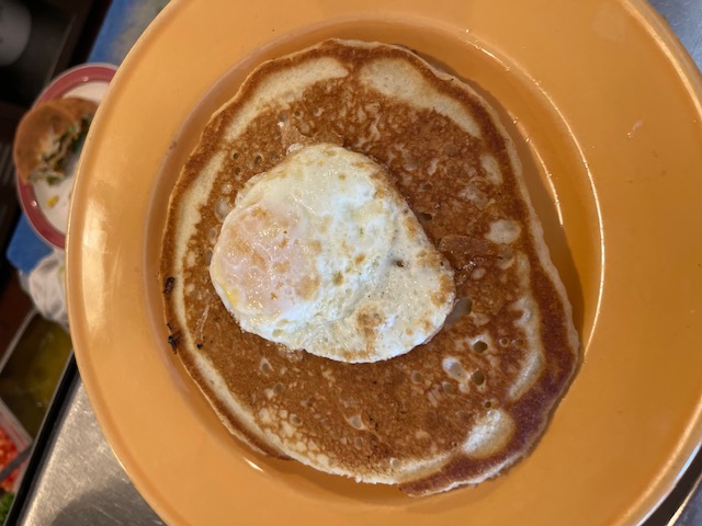 Order 1. Pancake and Egg Breakfast  food online from Ricks Restaurant store, Palm Springs on bringmethat.com
