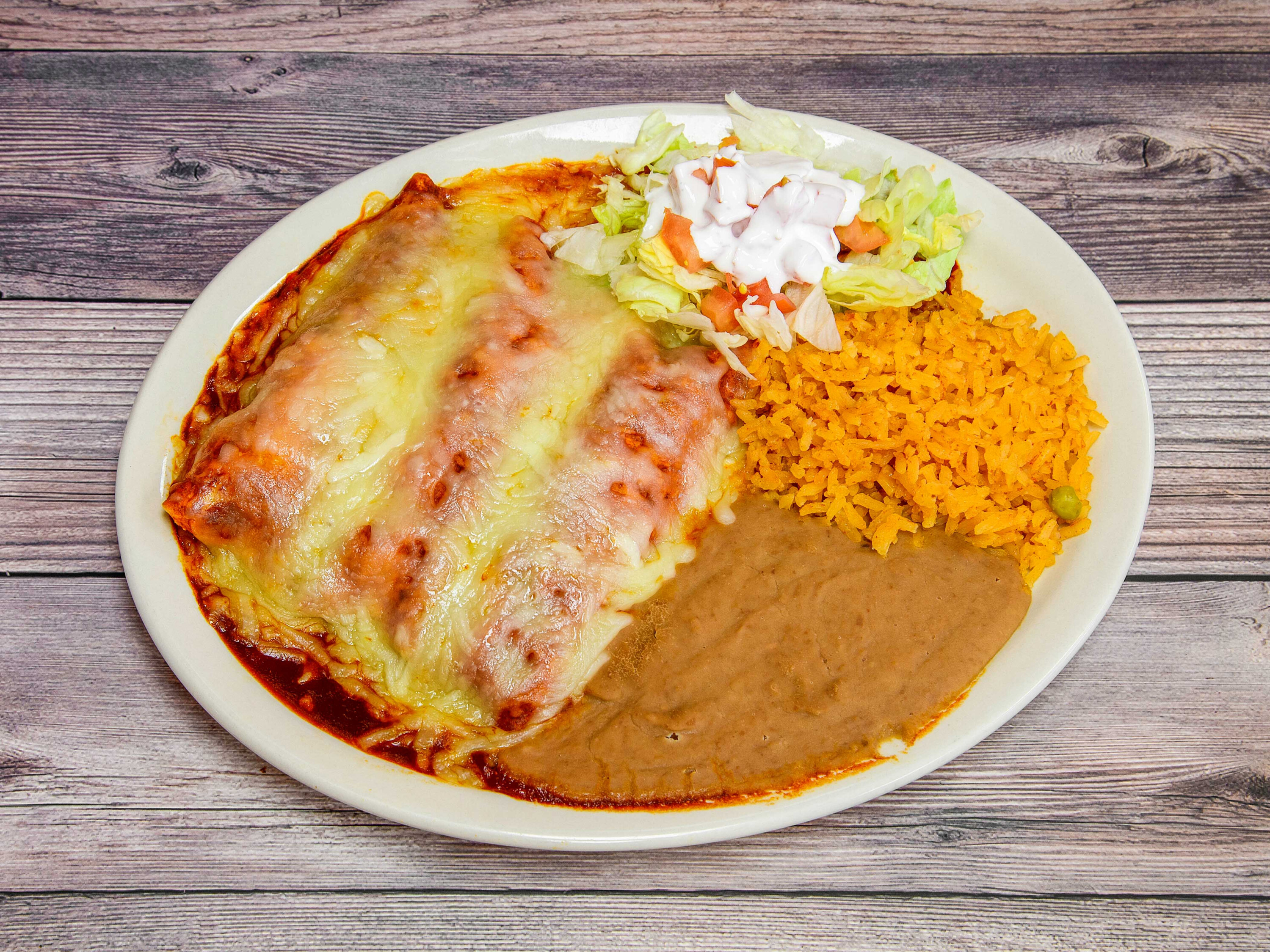 Order Enchiladas Rojas food online from El Faro Mexican Food store, Austin on bringmethat.com