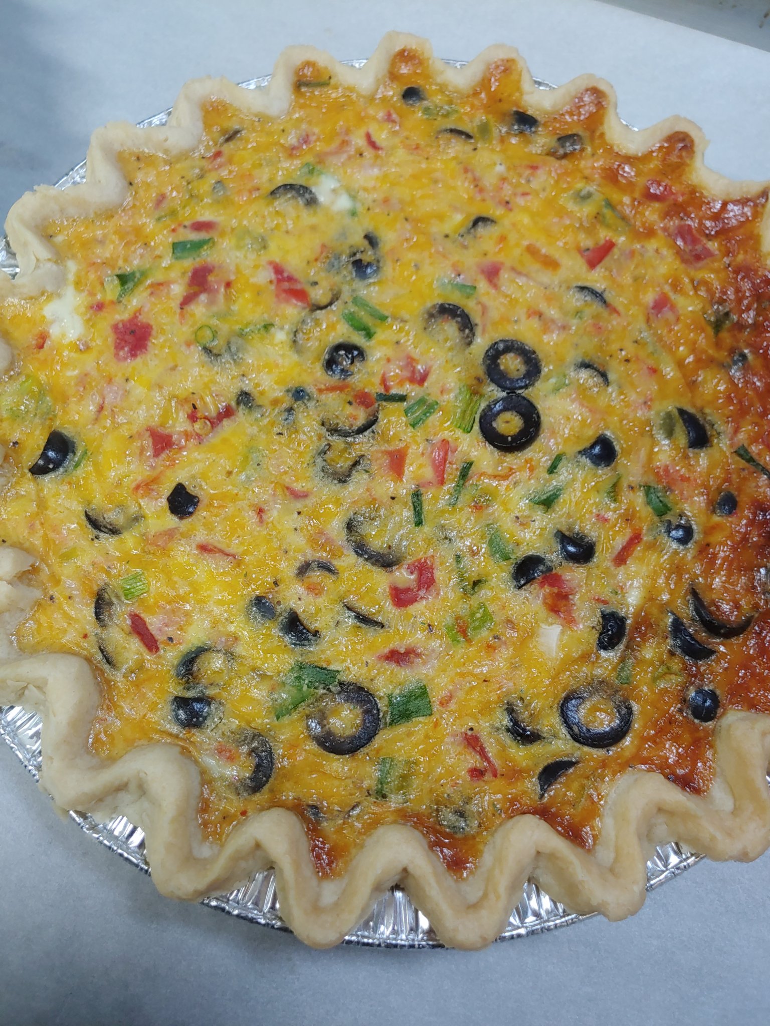 Order Quiche of the Day food online from Aint Just Pie store, Greenville on bringmethat.com