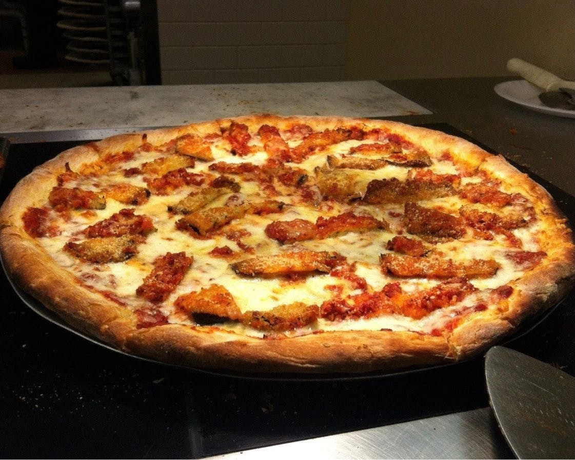 Order Eggplant Parmigiana Pizza - Personal food online from Rodolfo Pizzeria store, South Plainfield on bringmethat.com