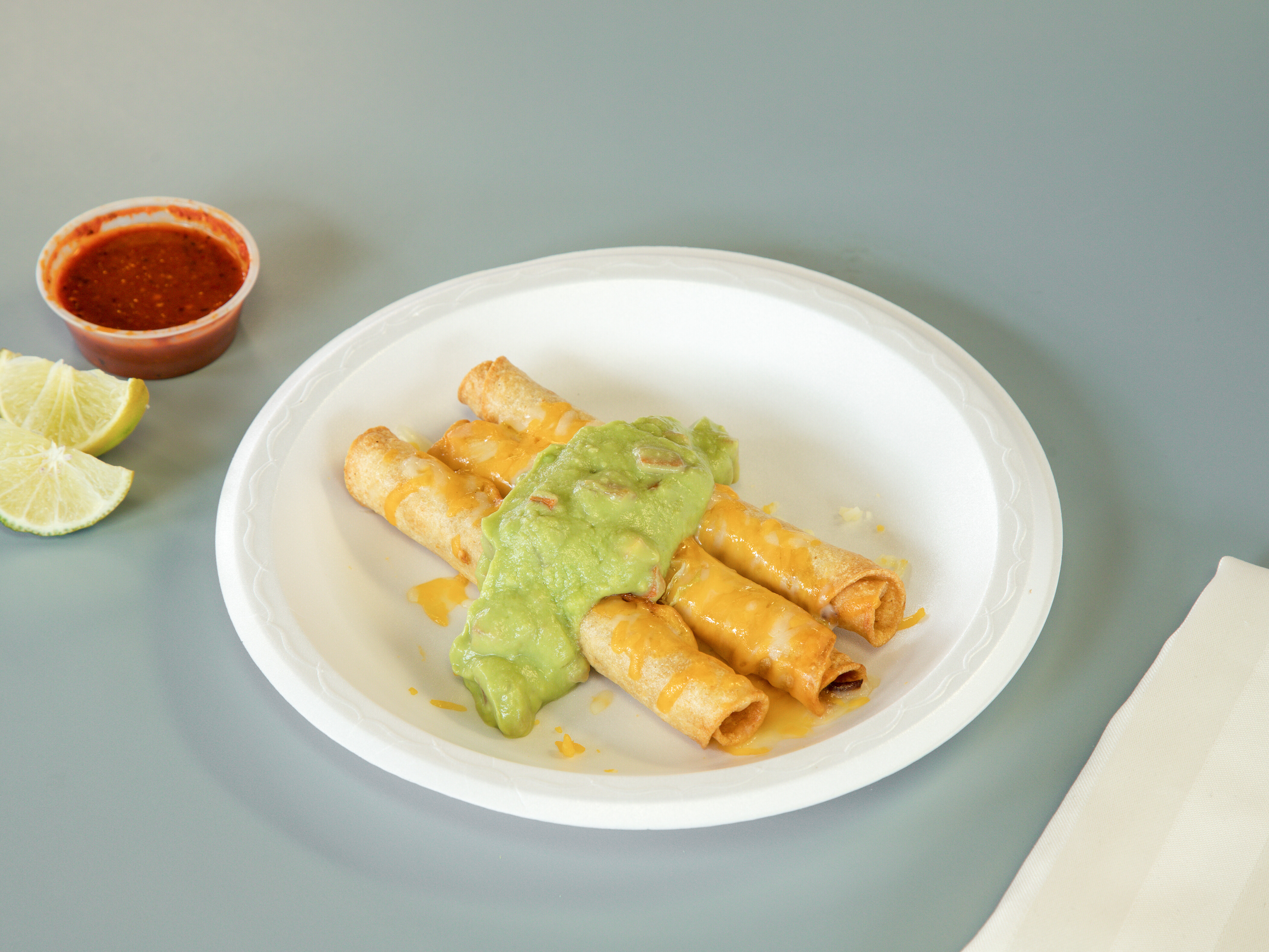 Order 3 Rolled Tacos with Guacamole food online from Aldertos Fresh Mexican Food store, Reno on bringmethat.com