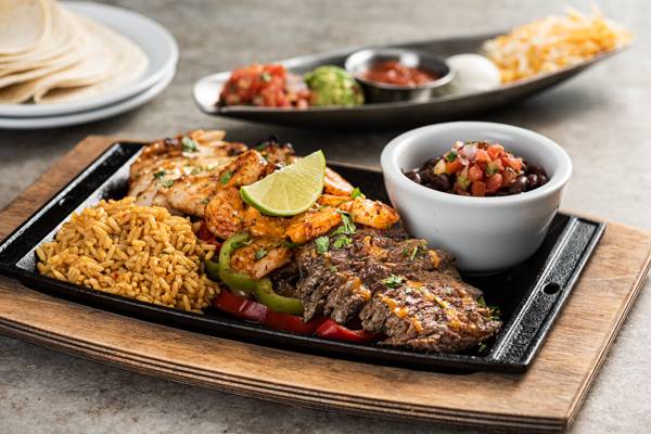 Order Mix & Match Fajita Trio food online from Chilis store, Highlands Ranch on bringmethat.com