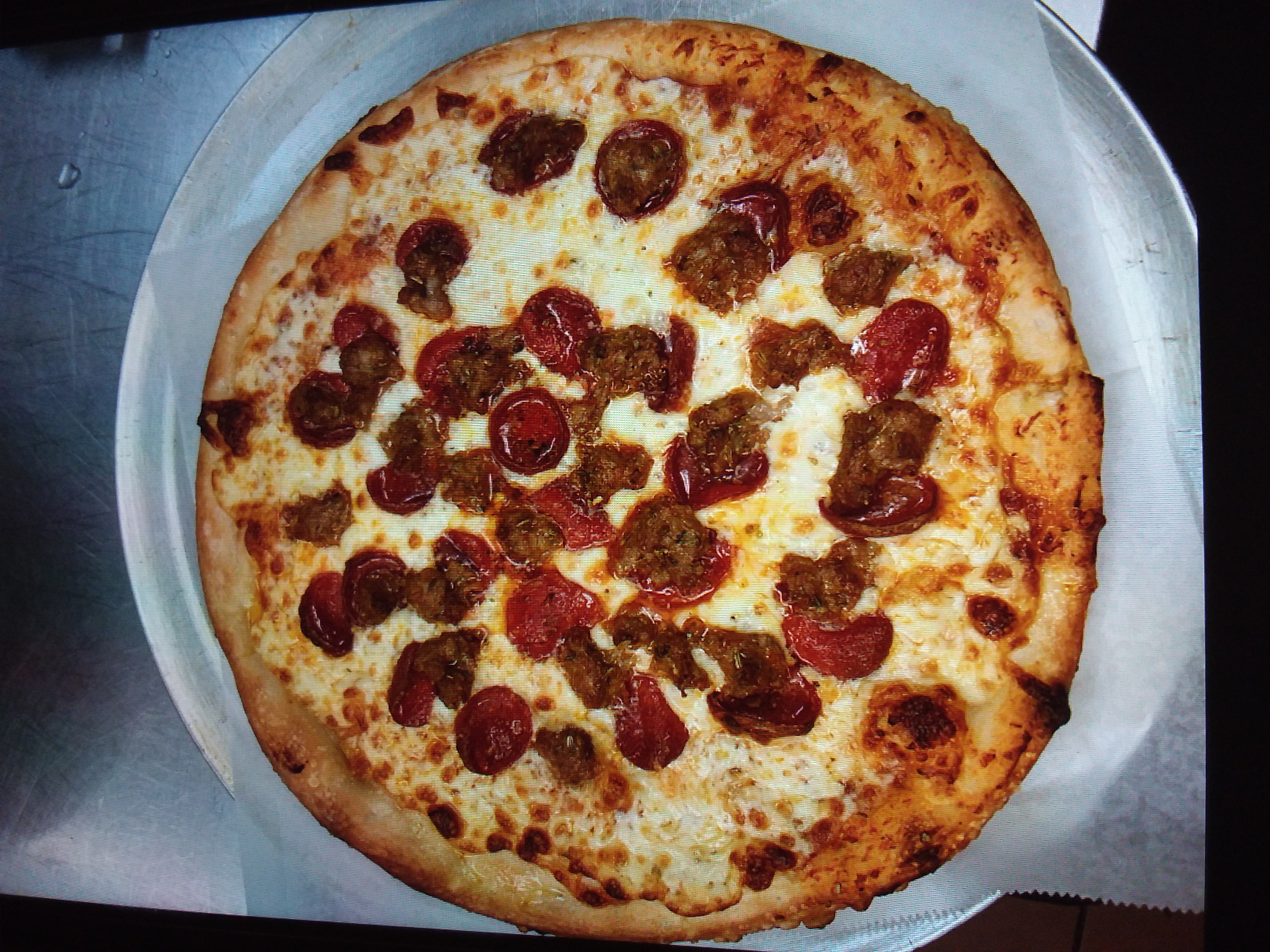 Order Homemade Italian Style Pizza food online from One Slice of New York store, Las Vegas on bringmethat.com
