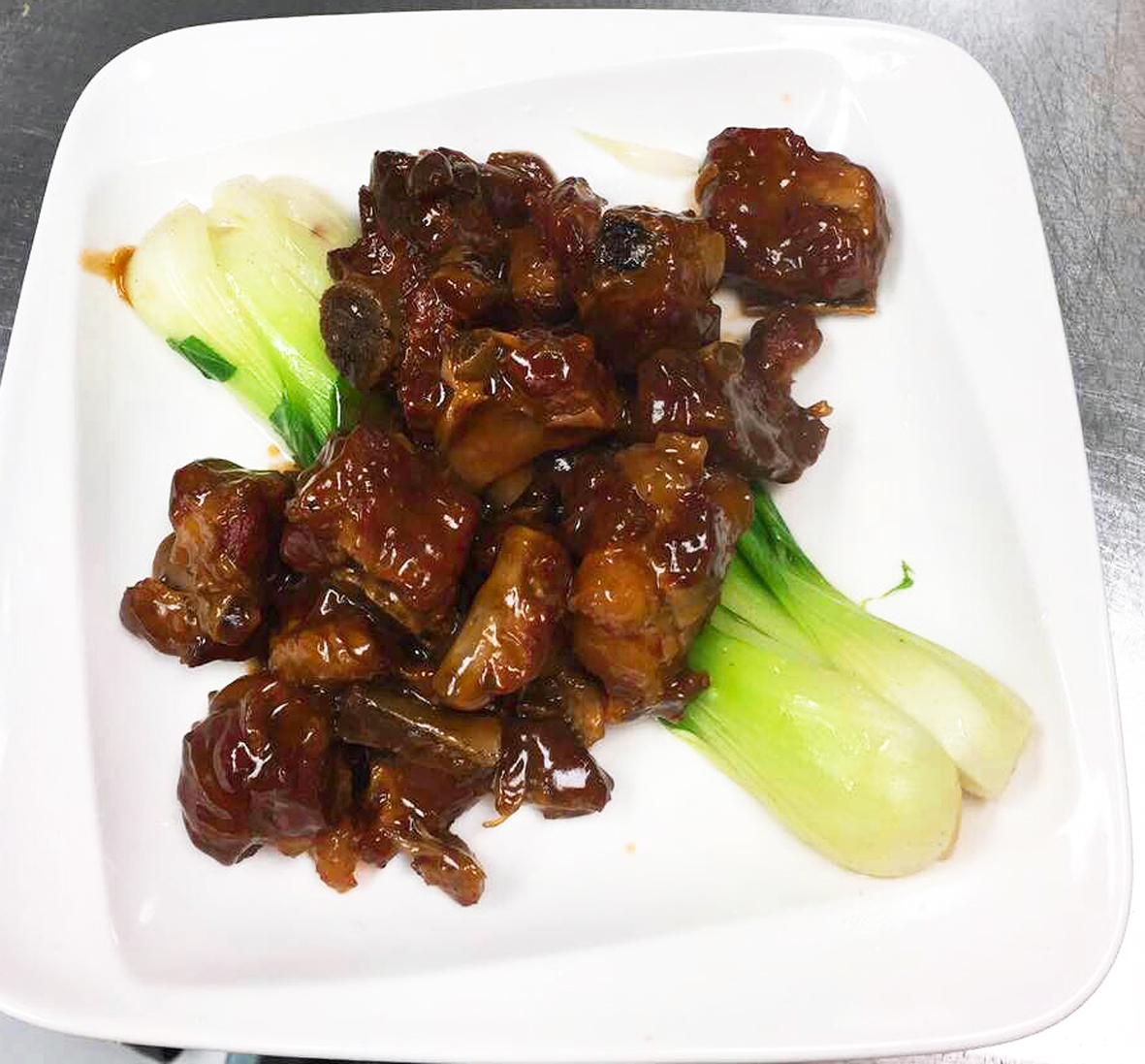 Order D04. Braised Spare Ribs in Brown Sauce無錫小排骨 food online from Gourmet China House store, Boston on bringmethat.com