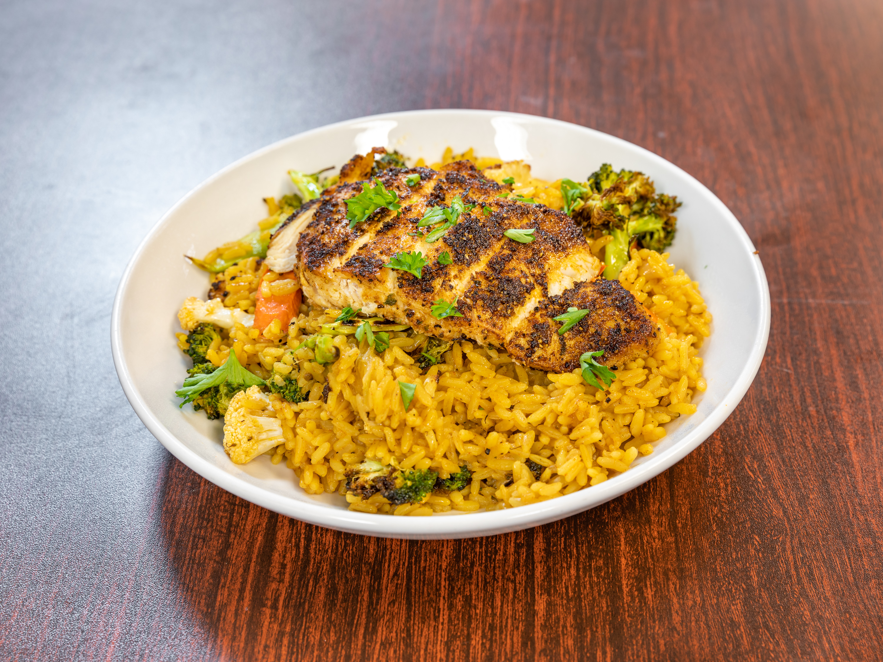 Order Blackened Salmon with Veggie Rice Pilaf food online from Almost Typical Kitchen store, Calumet City on bringmethat.com