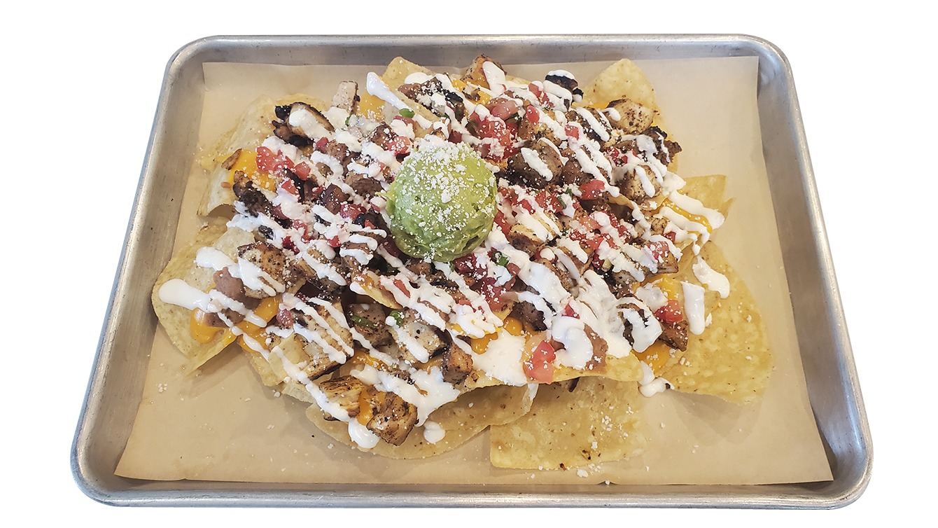 Order Loaded Chicken Nachos food online from Tipping Point store, Modesto on bringmethat.com