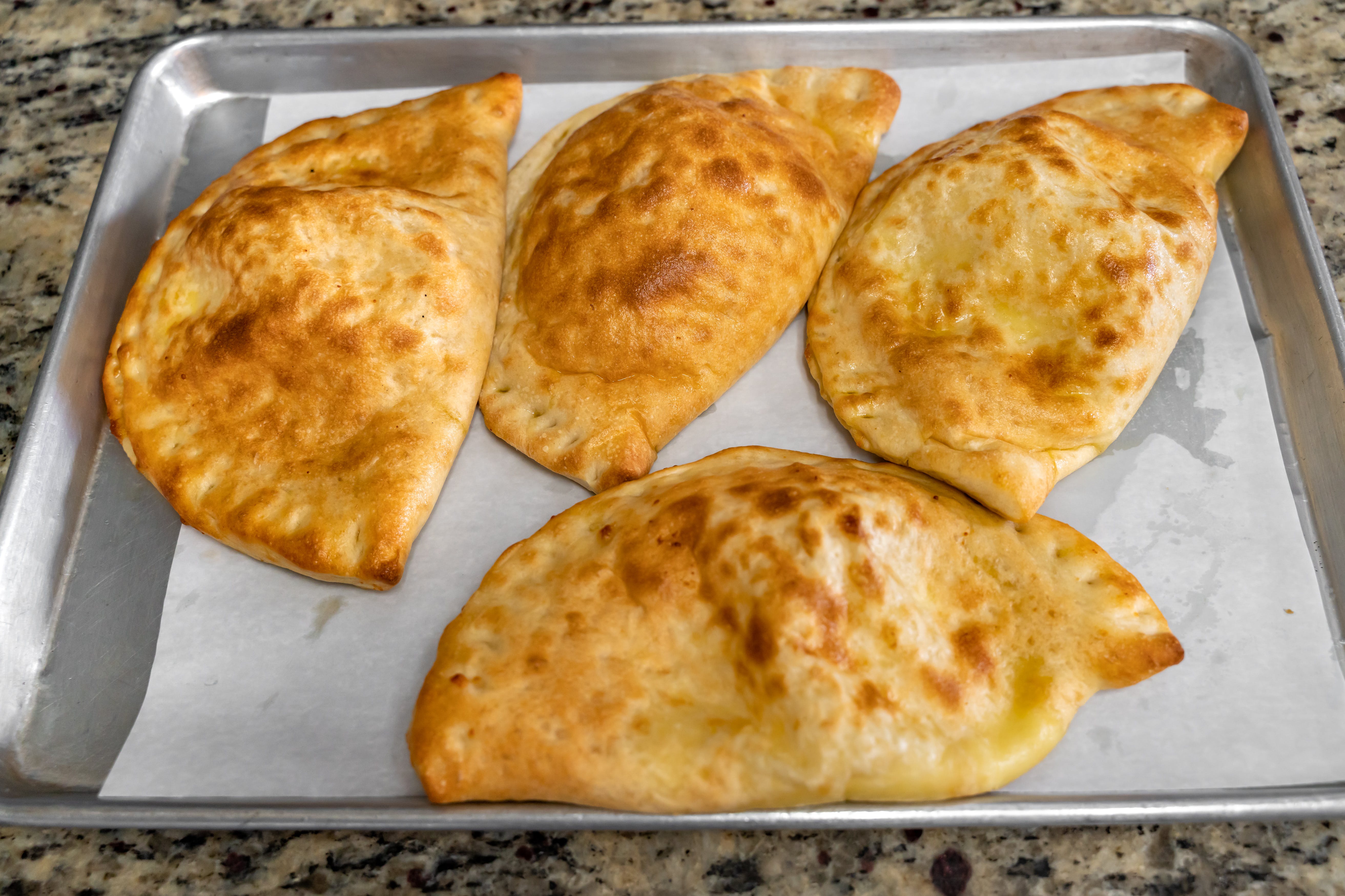 Order Calzone - Calzone food online from New York Pizza store, Taylor on bringmethat.com