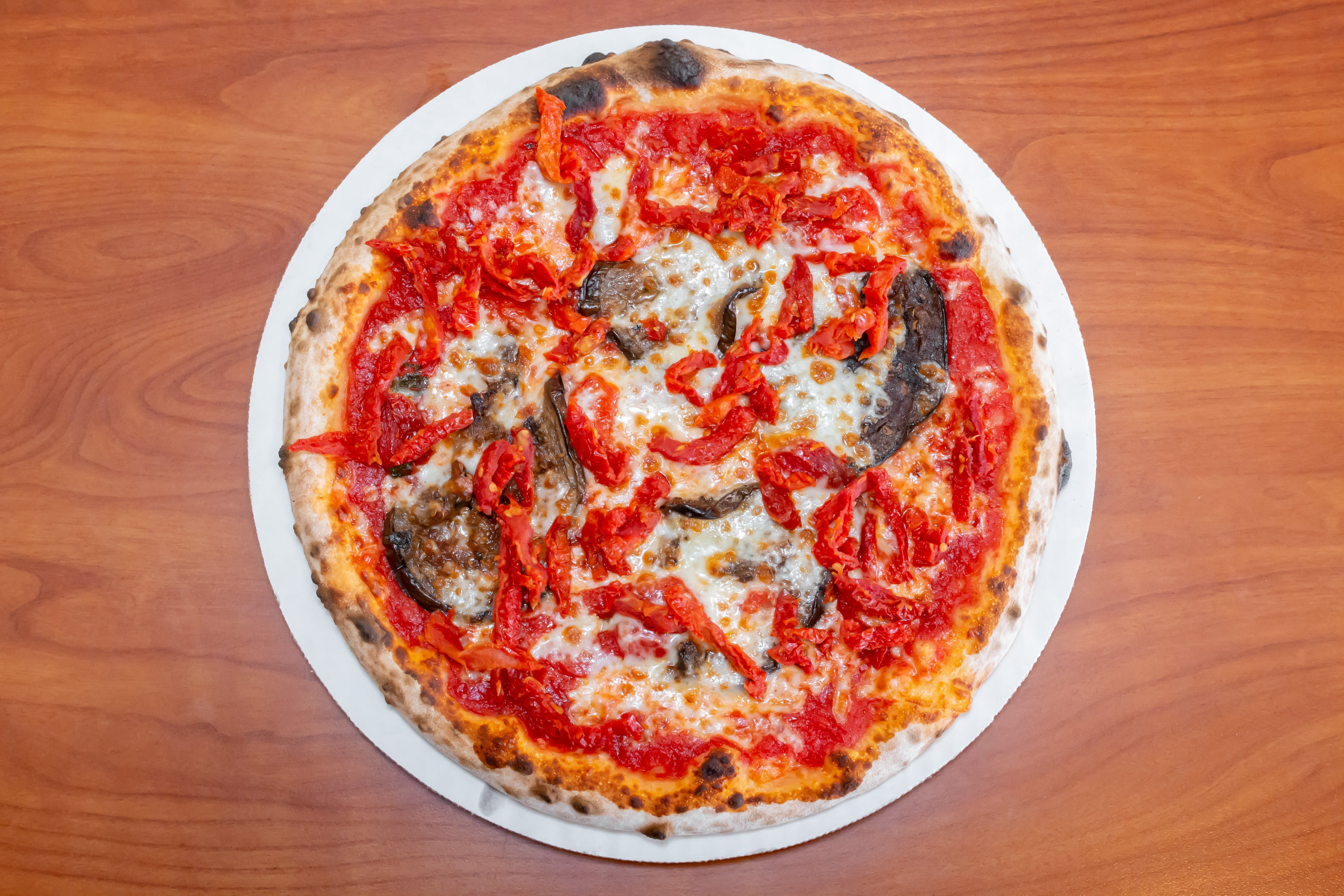 Order Vegetarian Pizza - Medium 12'' (8 Slices) food online from Serino's Italian Deli store, Addison on bringmethat.com