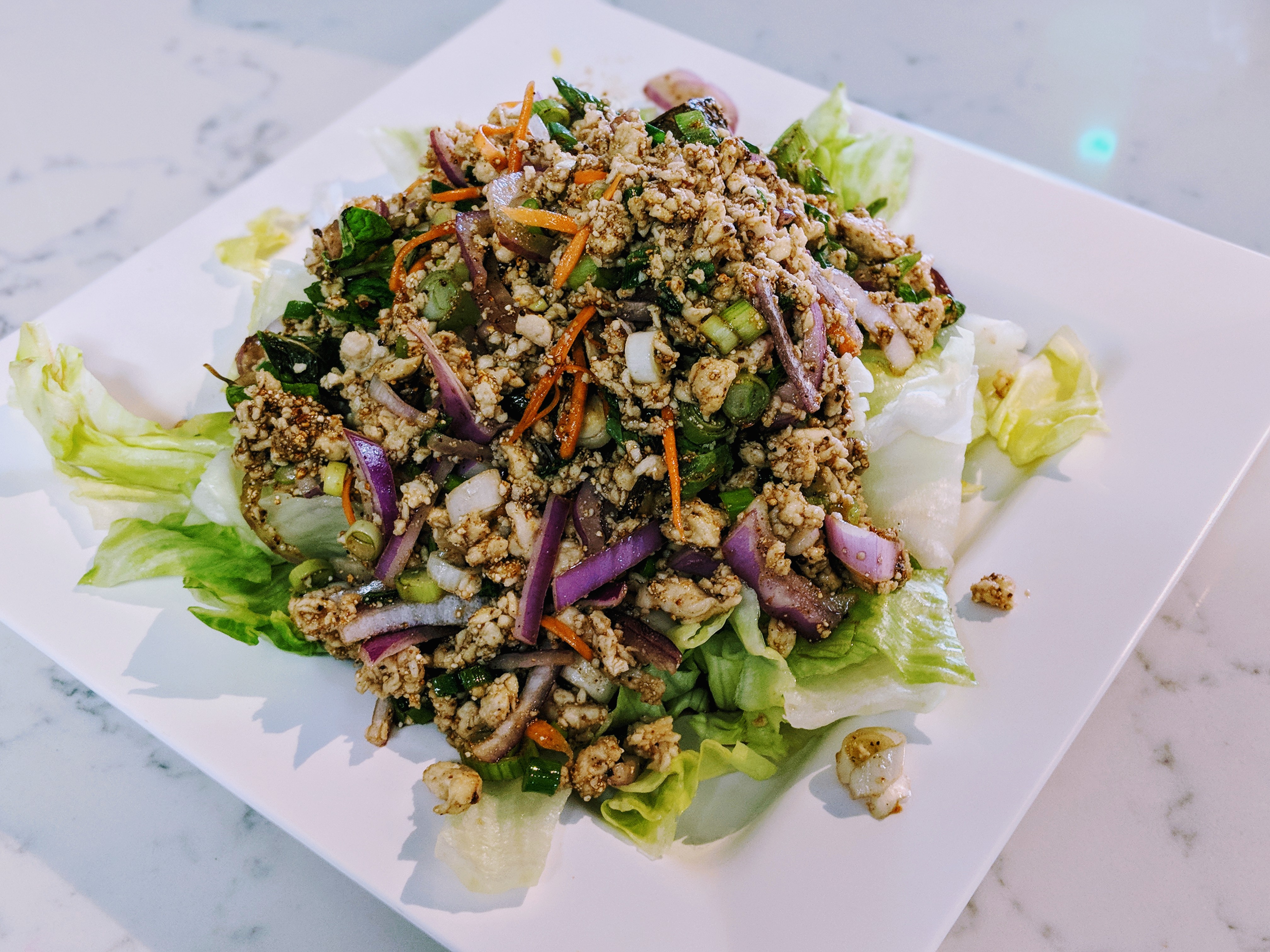 Order 19. Larb Chicken Salad food online from Khunying Thai store, San Jose on bringmethat.com