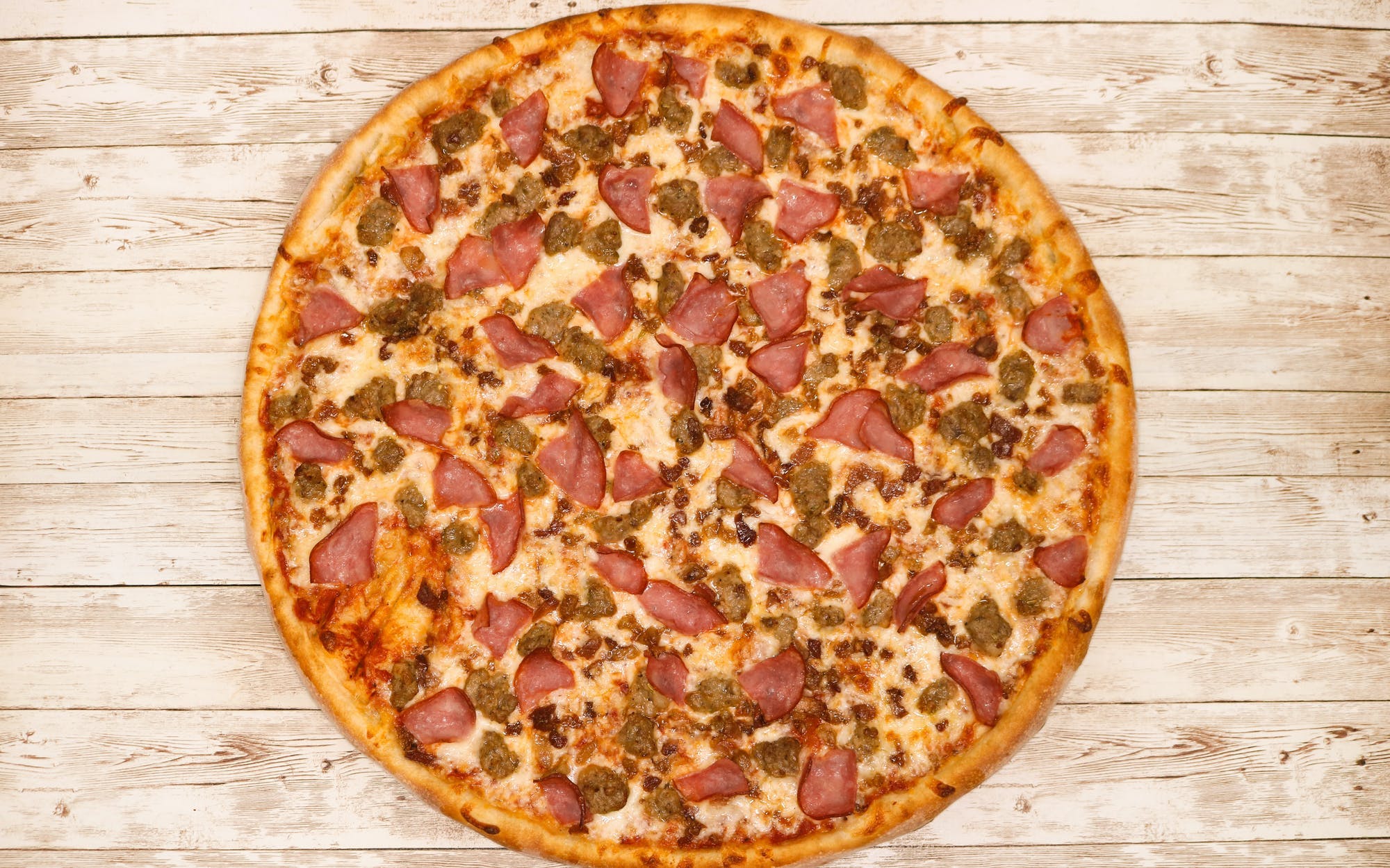 Order The Meat Sweats - X-Large 17" food online from Muncheez By Villa Pizza store, North Olmsted on bringmethat.com