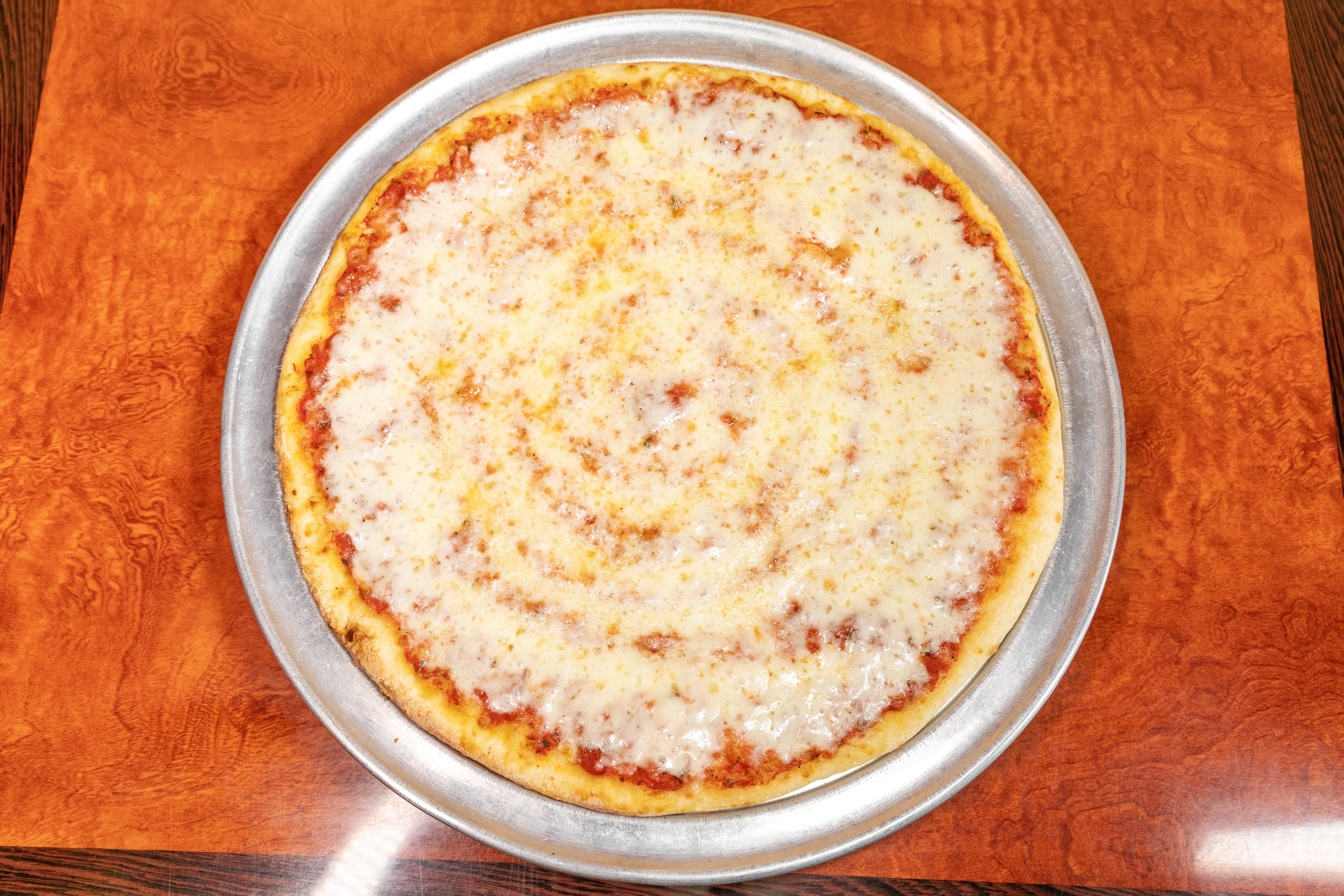 Order Cheese Pizza - Personal 10" (4 Slices) food online from Empanada Man Pizzeria store, Lake Forest on bringmethat.com