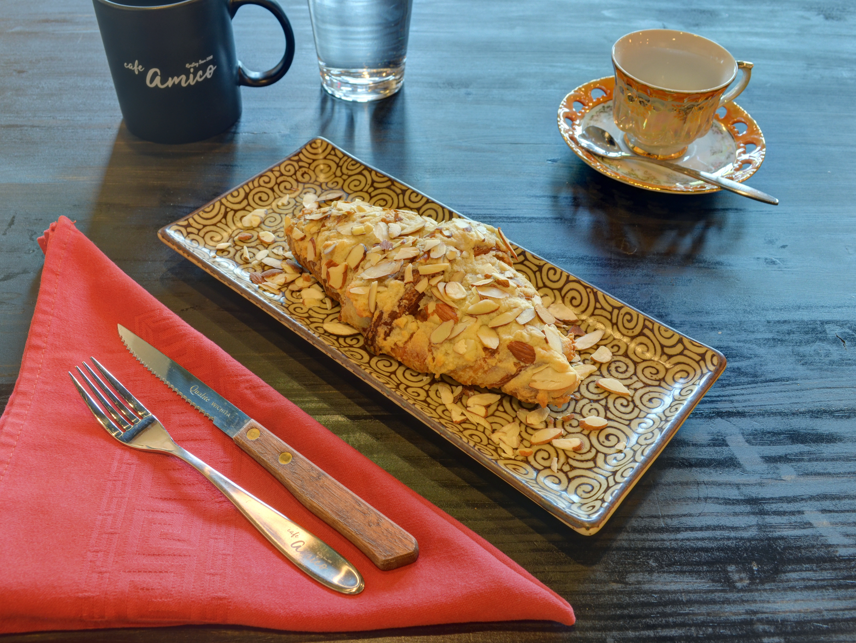 Order Almond Croissant food online from Cafe Amico store, Suwanee on bringmethat.com