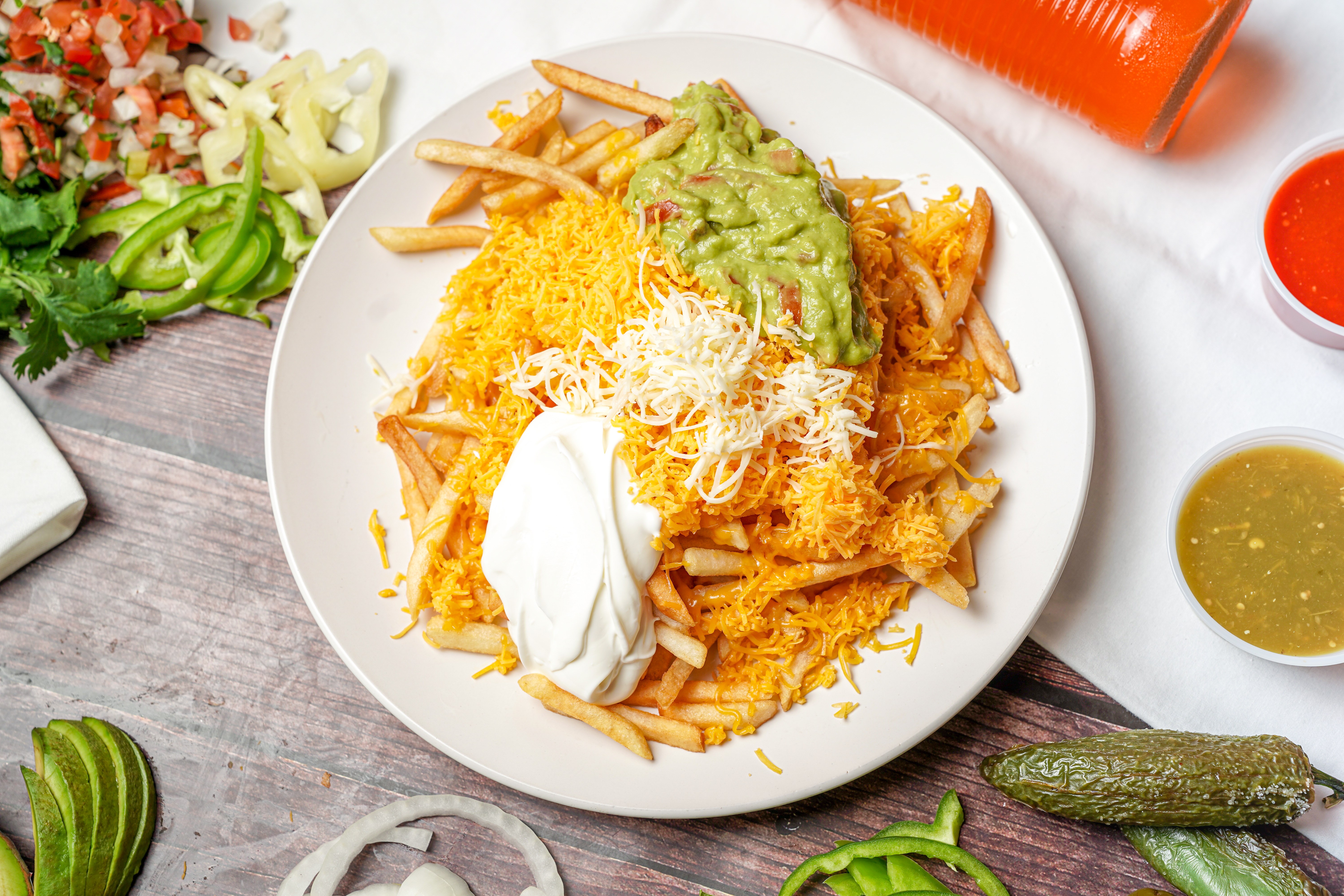 Order Fries, Guacamole, and Cheese food online from Albertaco Mexican Food store, San Marcos on bringmethat.com