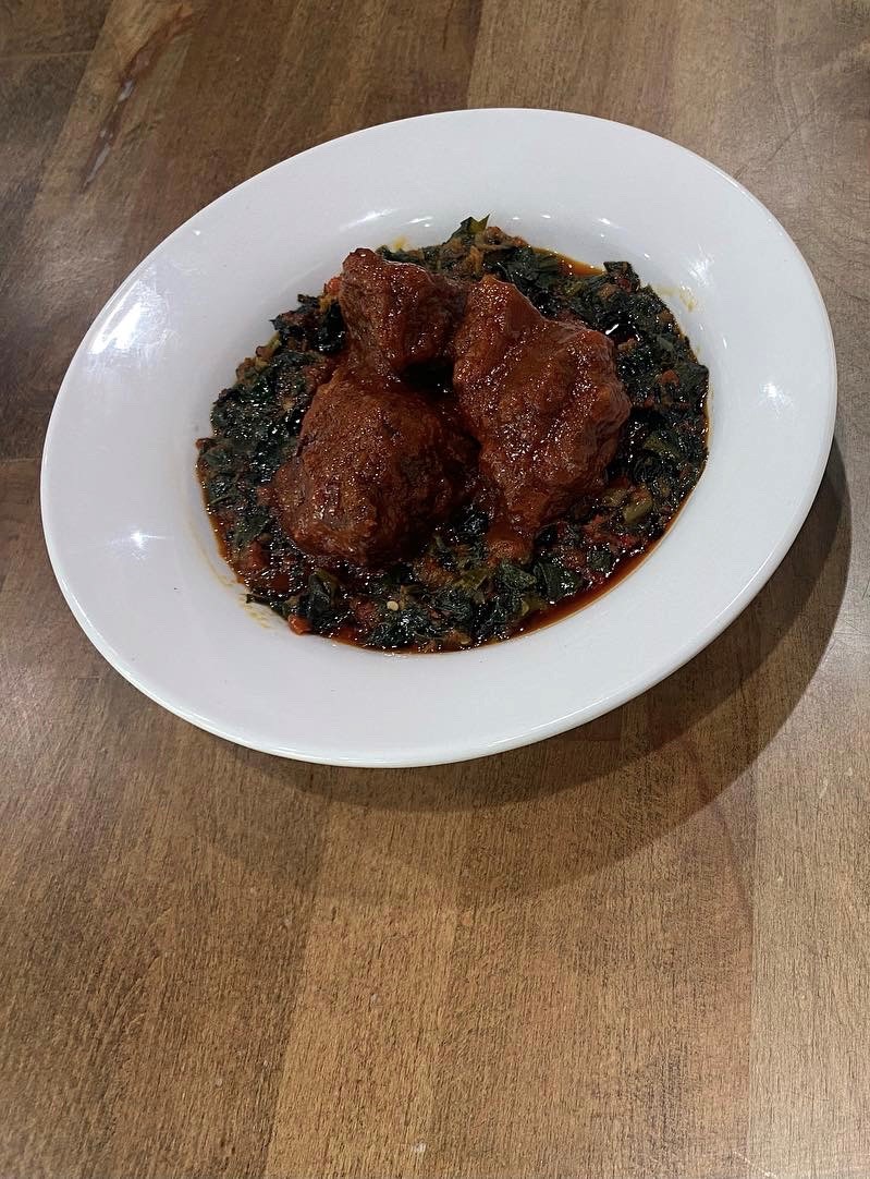 Order Efo Riro-Spinach + Beef food online from Fusion Vibes Kitchen + Bar store, Richardson on bringmethat.com