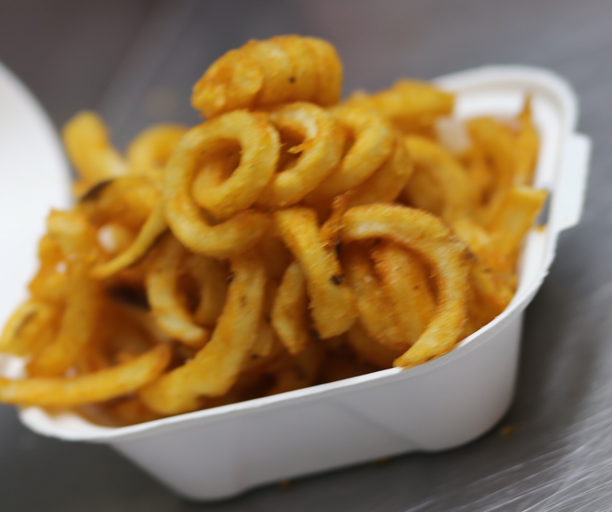 Order Crispy Curly Fries food online from The Burger Joint store, New York on bringmethat.com