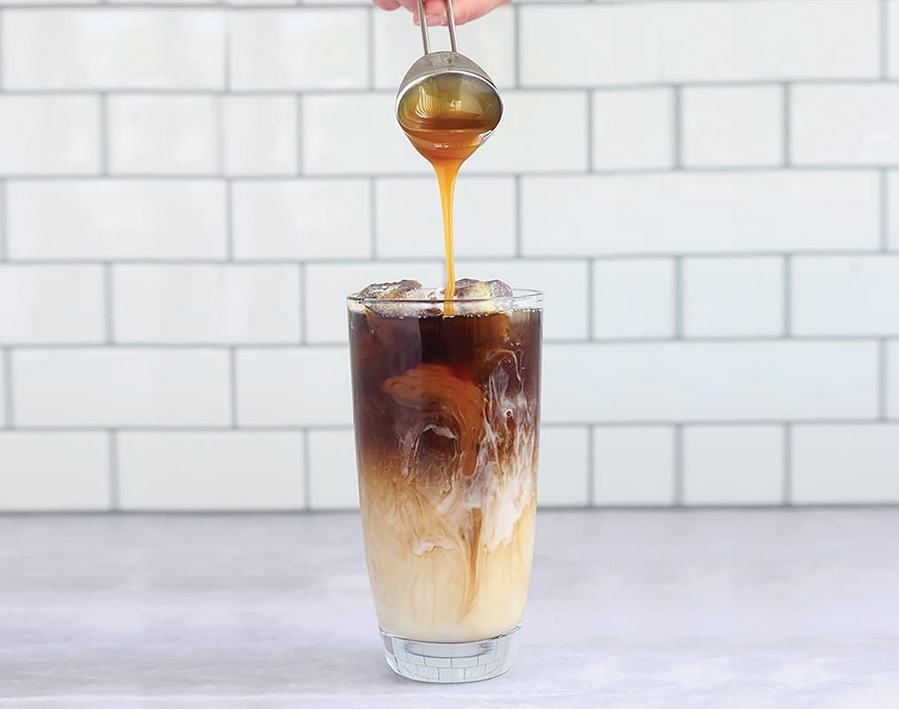 Order Iced Caramel Macchiato food online from Corner Bakery Cafe store, Chicago on bringmethat.com