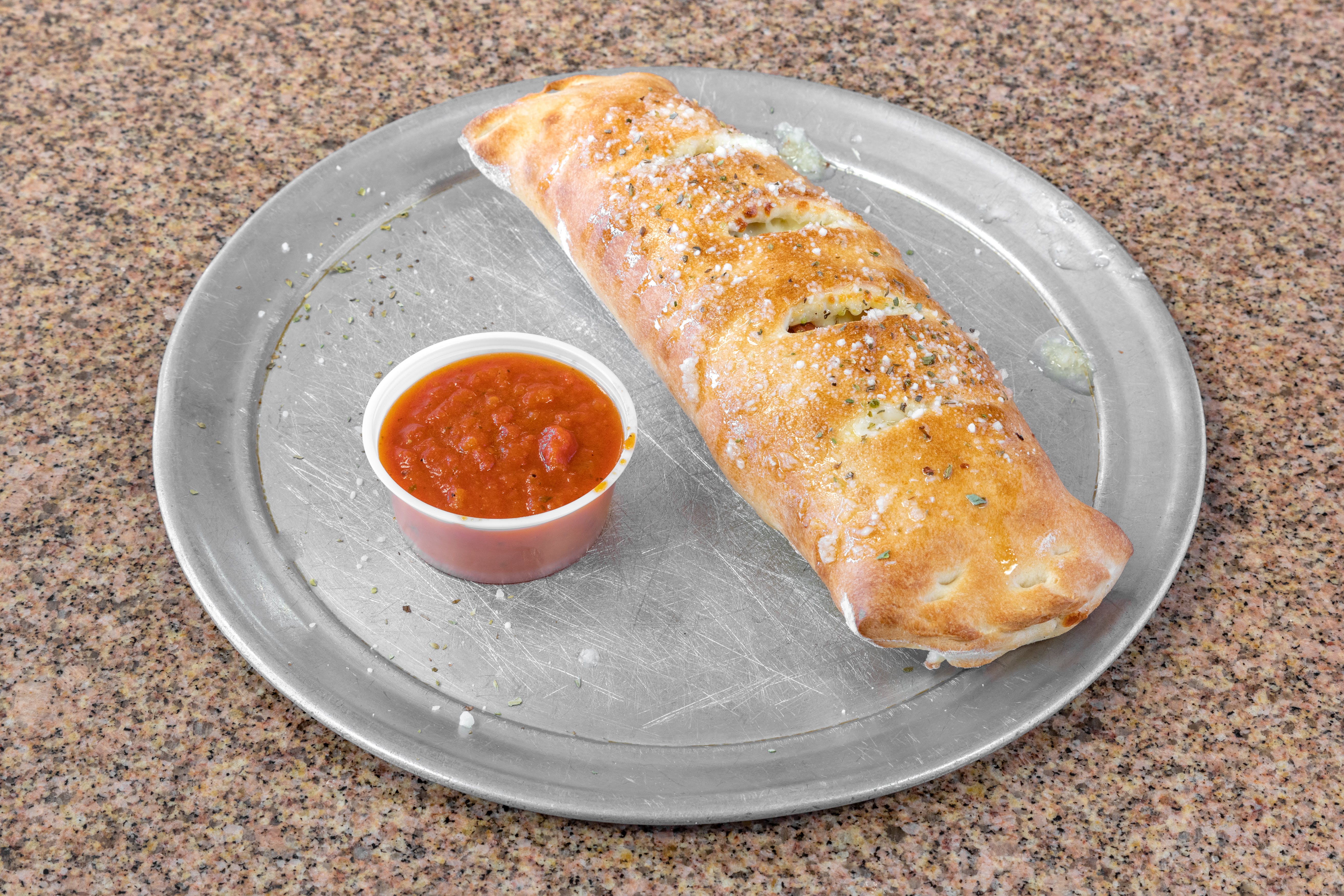 Order Stromboli - Stromboli food online from Taste of Italy Pizza and Pasta store, Goodyear on bringmethat.com