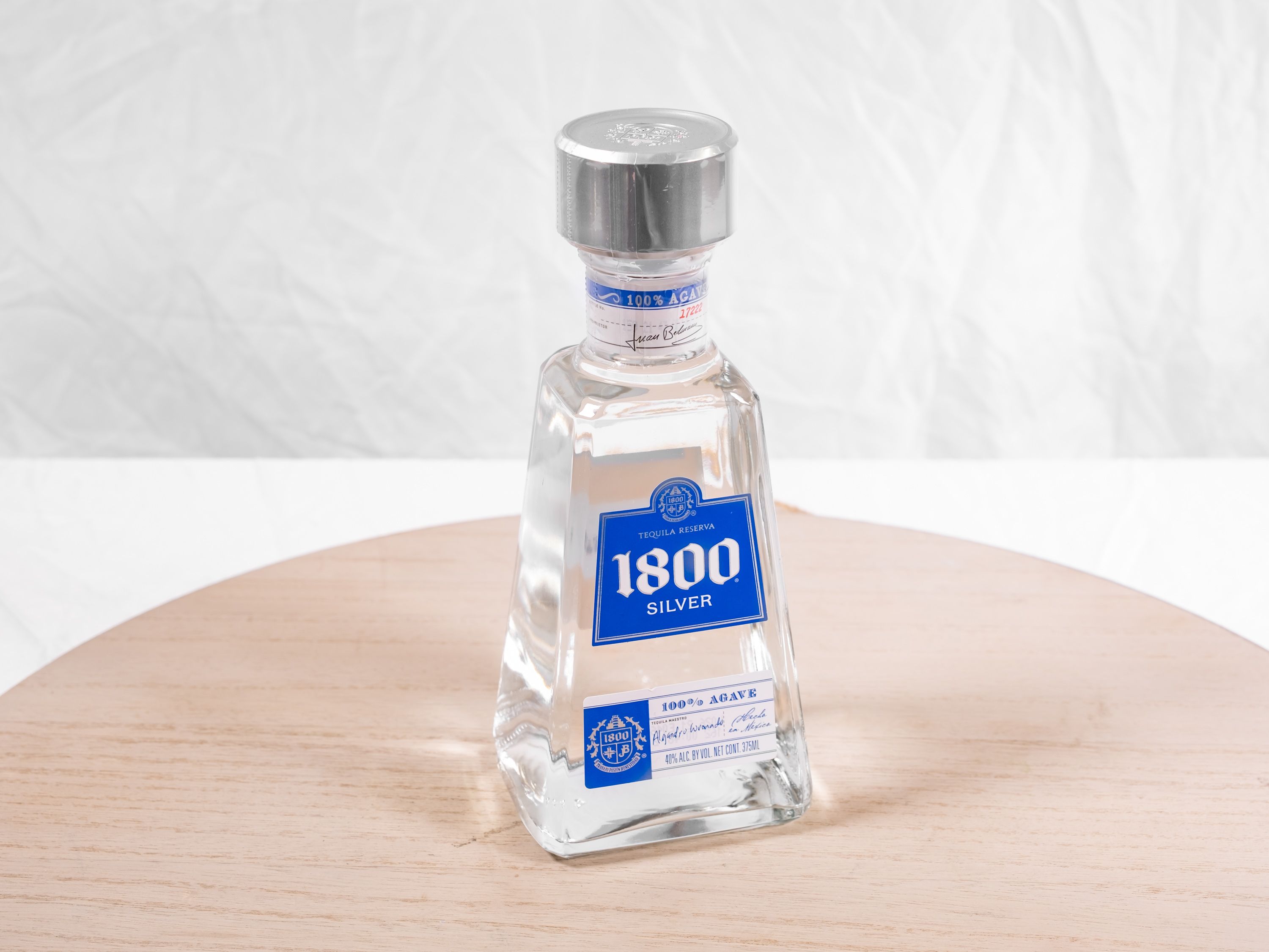 Order 375  ml. 1800 Silver Tequila food online from M & G Market store, Highland on bringmethat.com