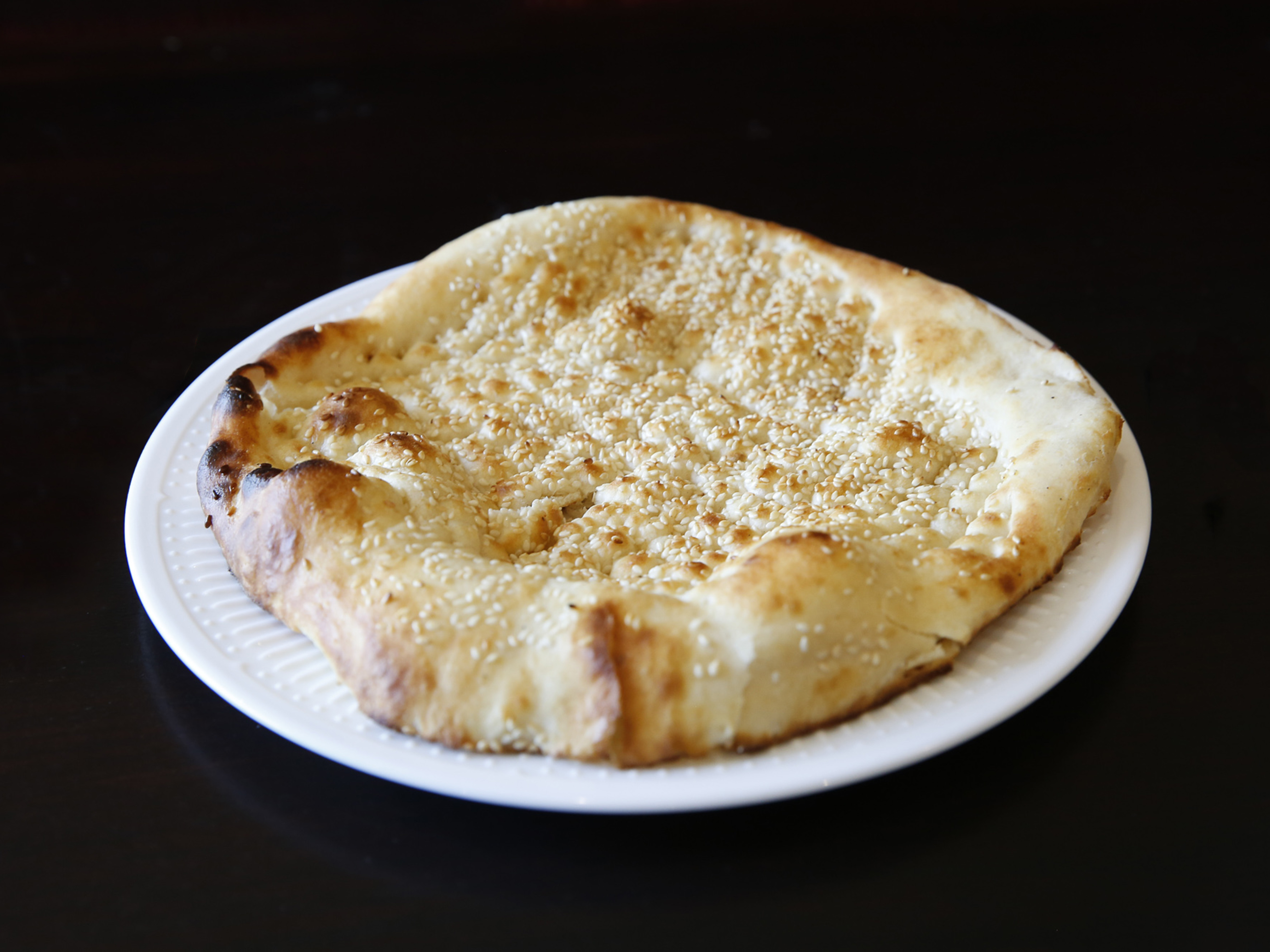 Order Rogni Naan food online from Tabaq Restaurant store, Edison on bringmethat.com