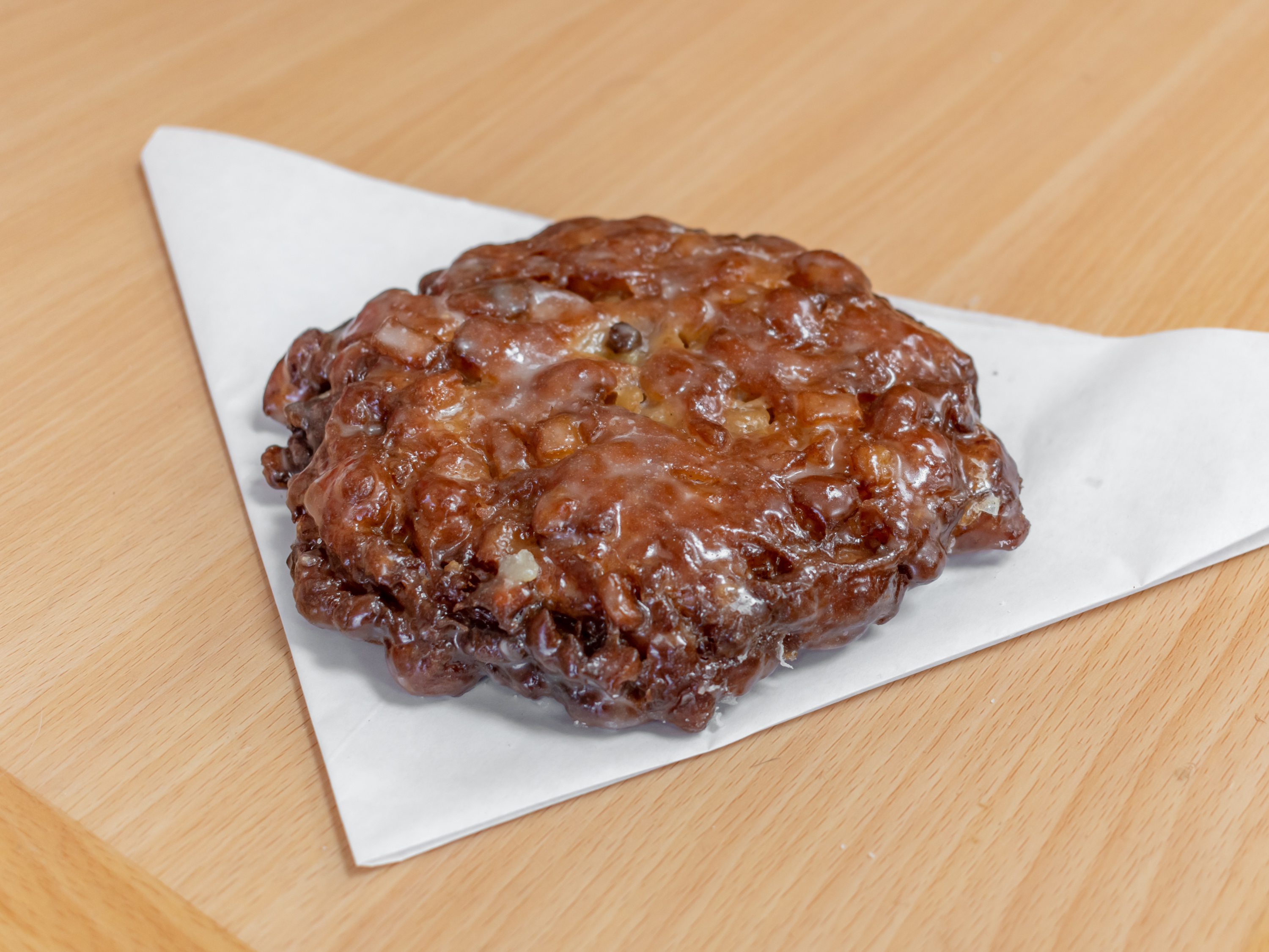 Order Apple Fritter food online from Vienna Donut & Ice Cream store, Cathedral City on bringmethat.com