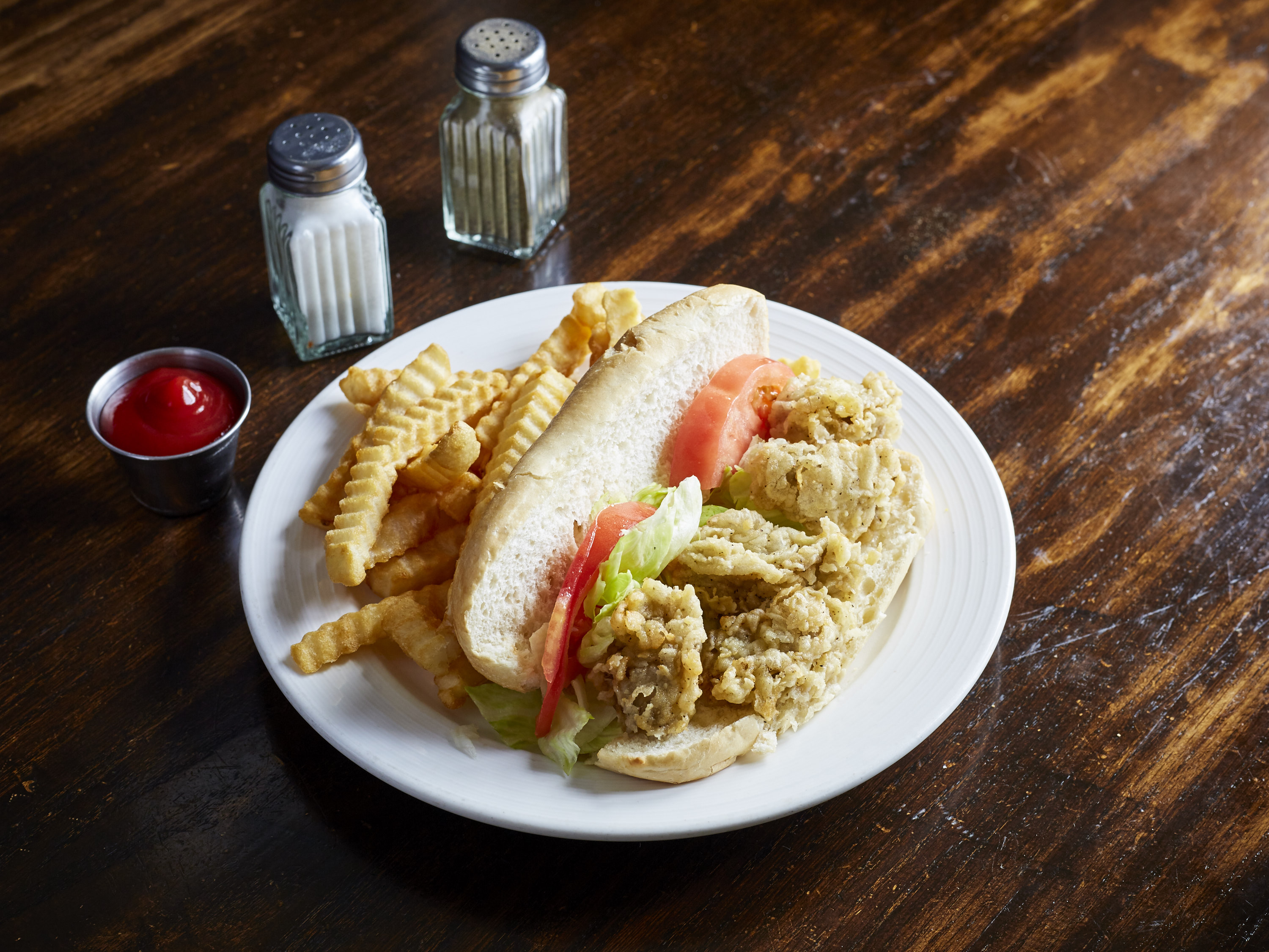 Order Oyster Po Boy food online from Dukes Wings And Seafood store, Plainville on bringmethat.com