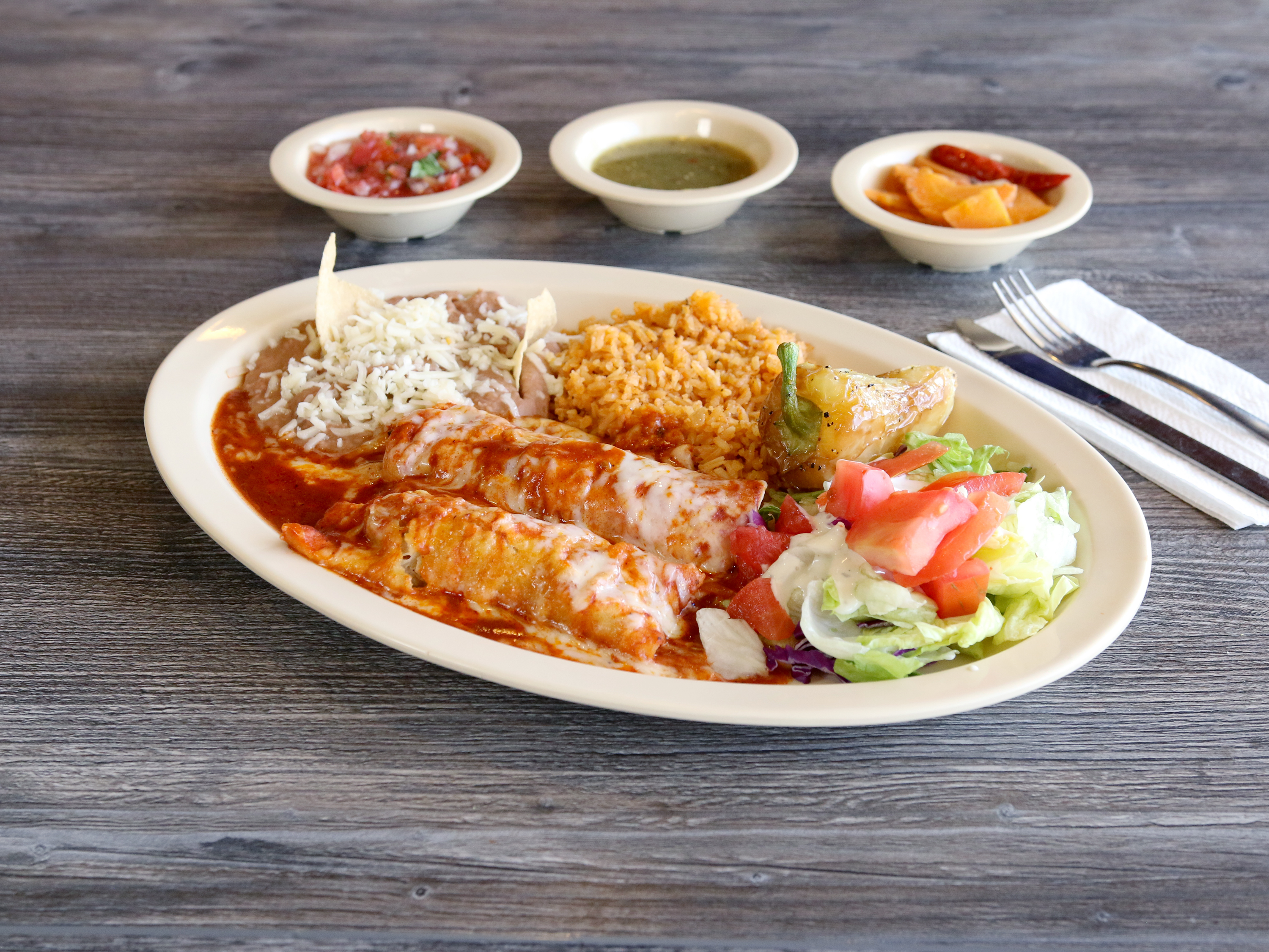 Order 4. Two Chicken Enchiladas food online from Juan Great Fiesta store, Montebello on bringmethat.com